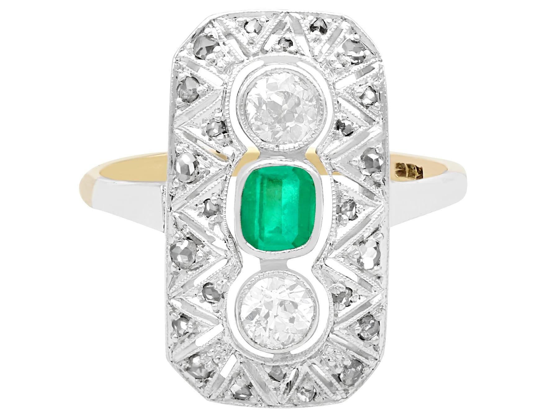 A stunning, fine and impressive 0.37 carat emerald and 0.78 carat diamond, 14 karat yellow gold, platinum set Art Deco ring; part of our diverse range of emerald jewellery.

This stunning Art Deco emerald and diamond ring has been crafted in 14k