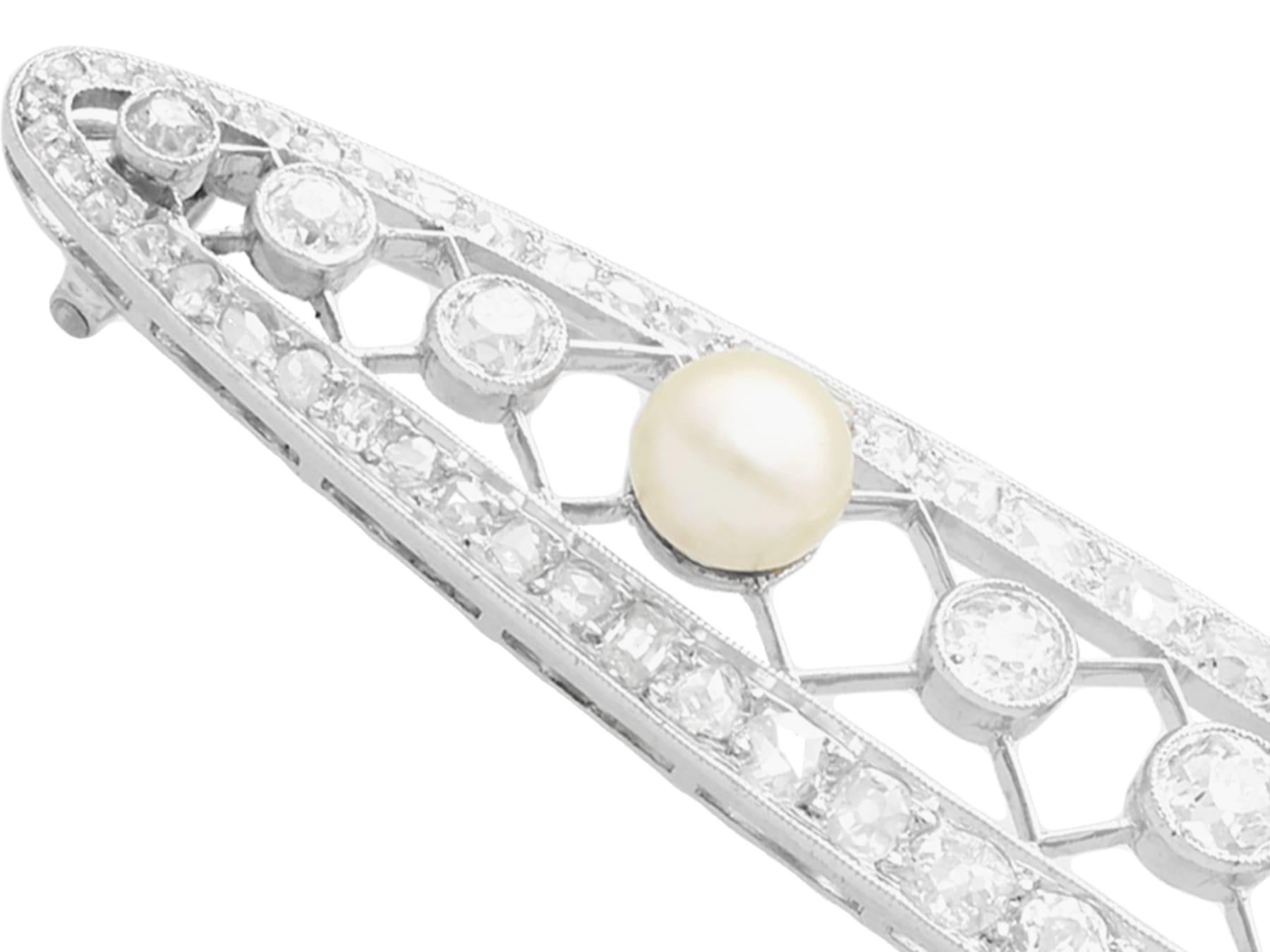 Women's or Men's 1920s, Antique French 3.46 Carat Diamond and Natural Pearl Platinum Brooch For Sale