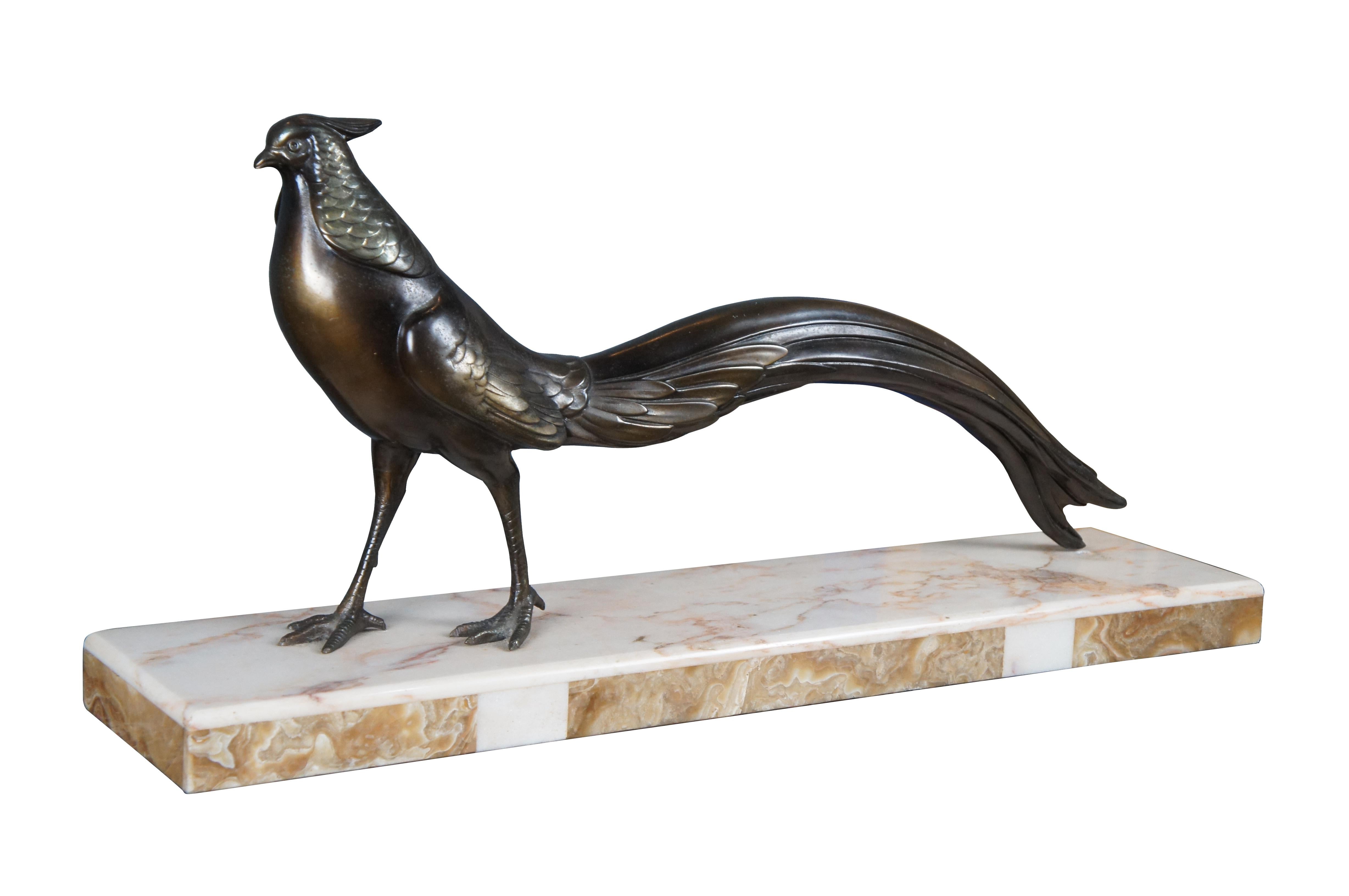 An exception French Art Deco Bronze Statue of Pheasant on Marble Base, circa 1920s. Features the flamboyant bird in a more relaxed mood, perhaps scouting for food while keeping a wary eye. Such a depiction was in keeping with the sleek, modernistic