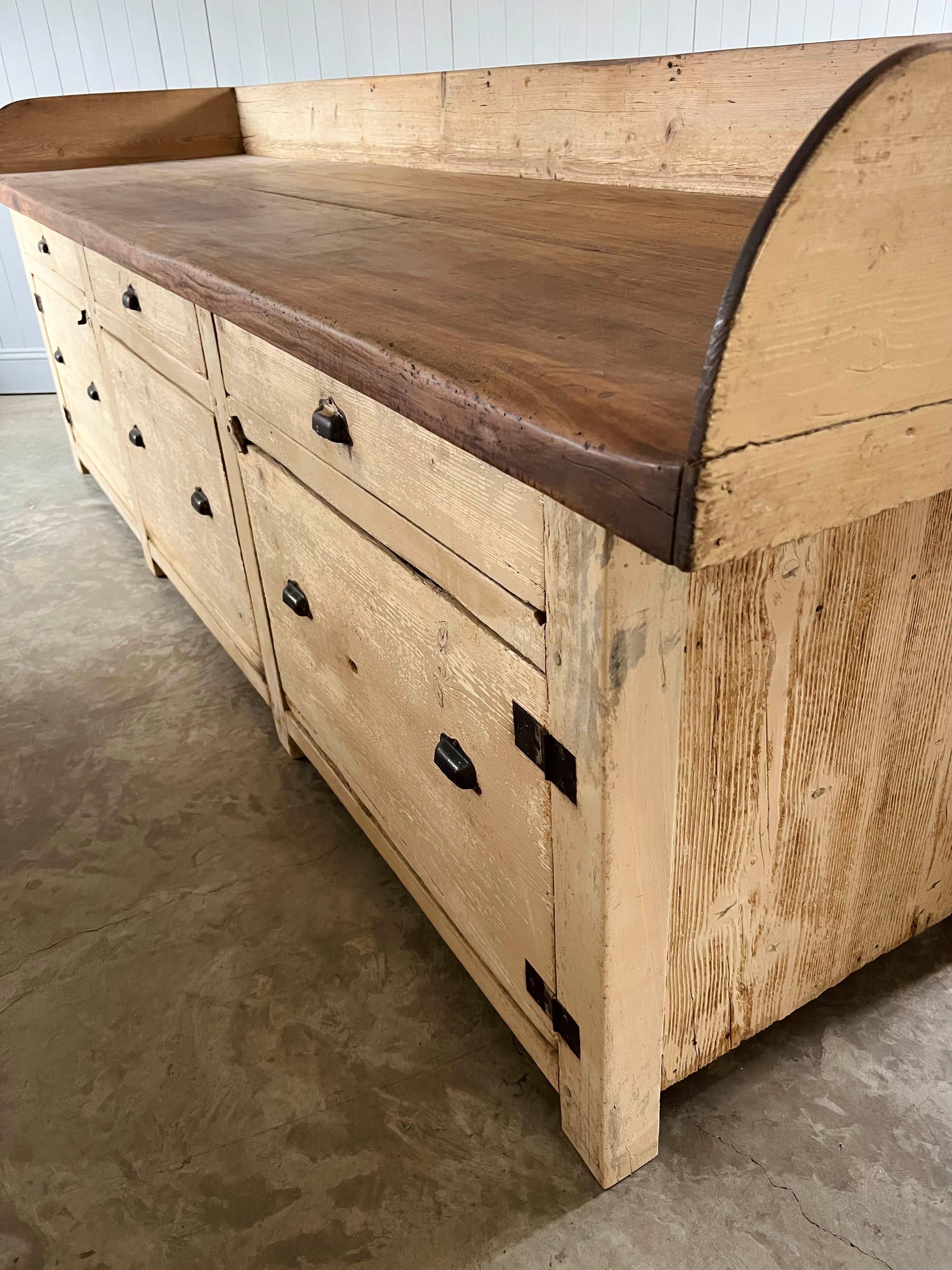 This amazing boulangerie sideboard was found in Toulon which is just East of Marseille.  The bakery building had been boarded up since 1965 and then recently sold for development. What a find !!!

Circa 1920's constructed with an oak frame, pine
