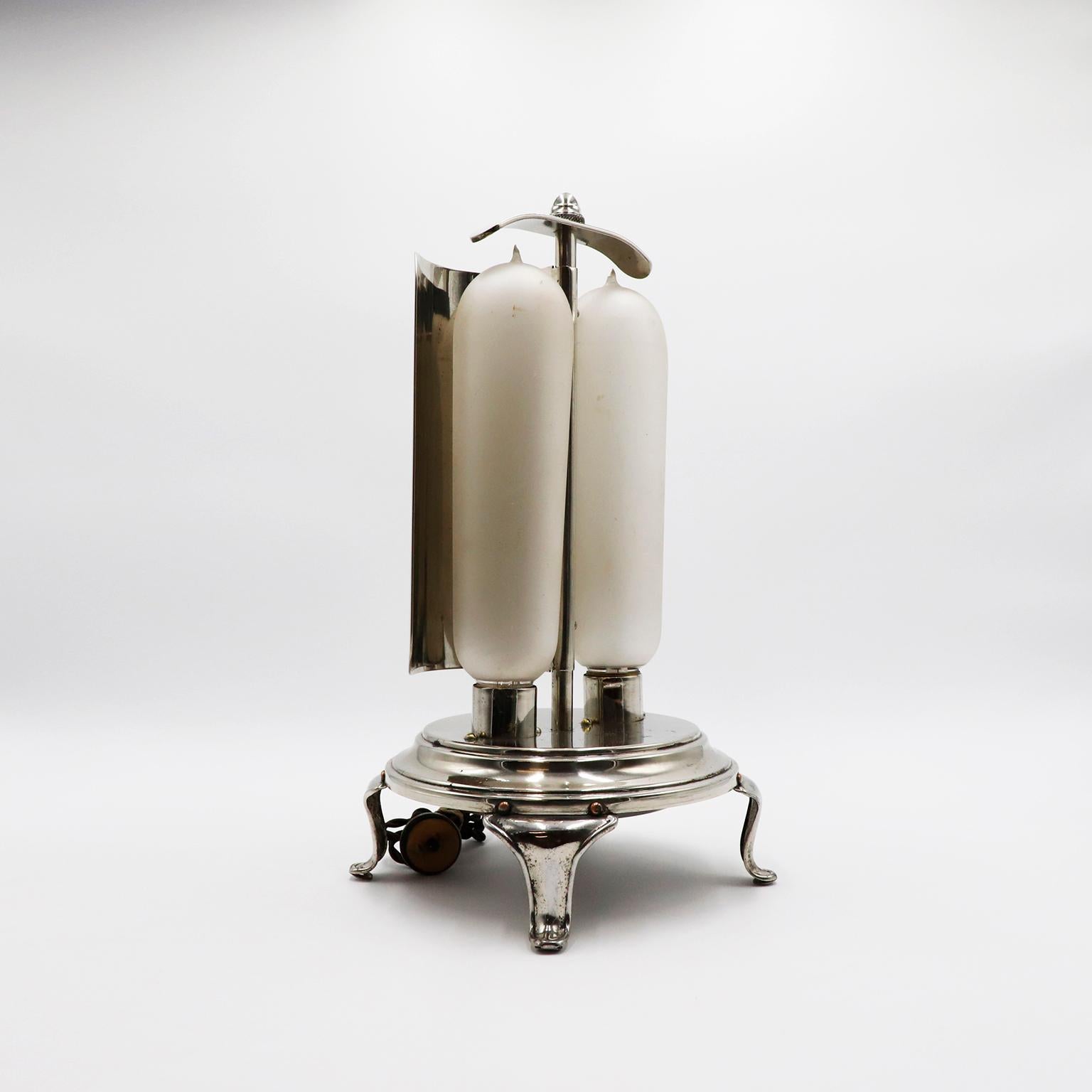 Circa 1920. We offer this hard to find Antique GE A-23 General Electric Bulb Space Heater.
For it's heat source it uses two enormous frosted tipped light bulbs that are over 10'' tall. They are rated at 250 watts each. The bulbs have large 