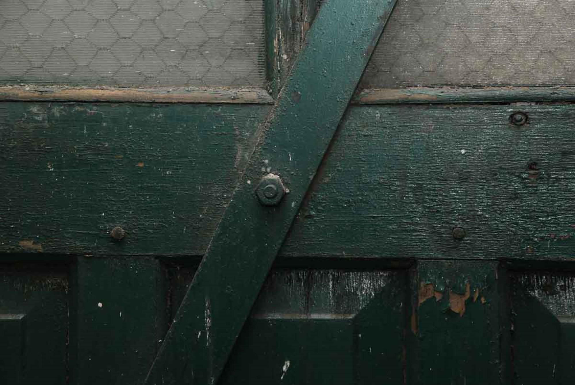American 1920s Antique Industrial Wood Door with Chicken Wire Glass Panels