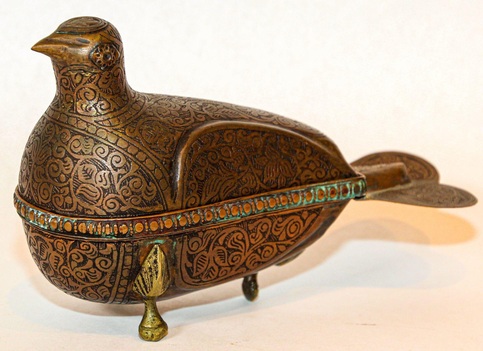 1920s Antique metal copper standing dove bird shaped betel box.Large Indo-Persian chiseled copper bronze box in Islamic Art style.The lidded container is a fine, scptural item handcrafted, etched and covered in intricate carvings, lidded covered