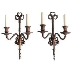 1920s Antique Pair of Bronze Two Arm Sconces with a Tied Ribbon Design