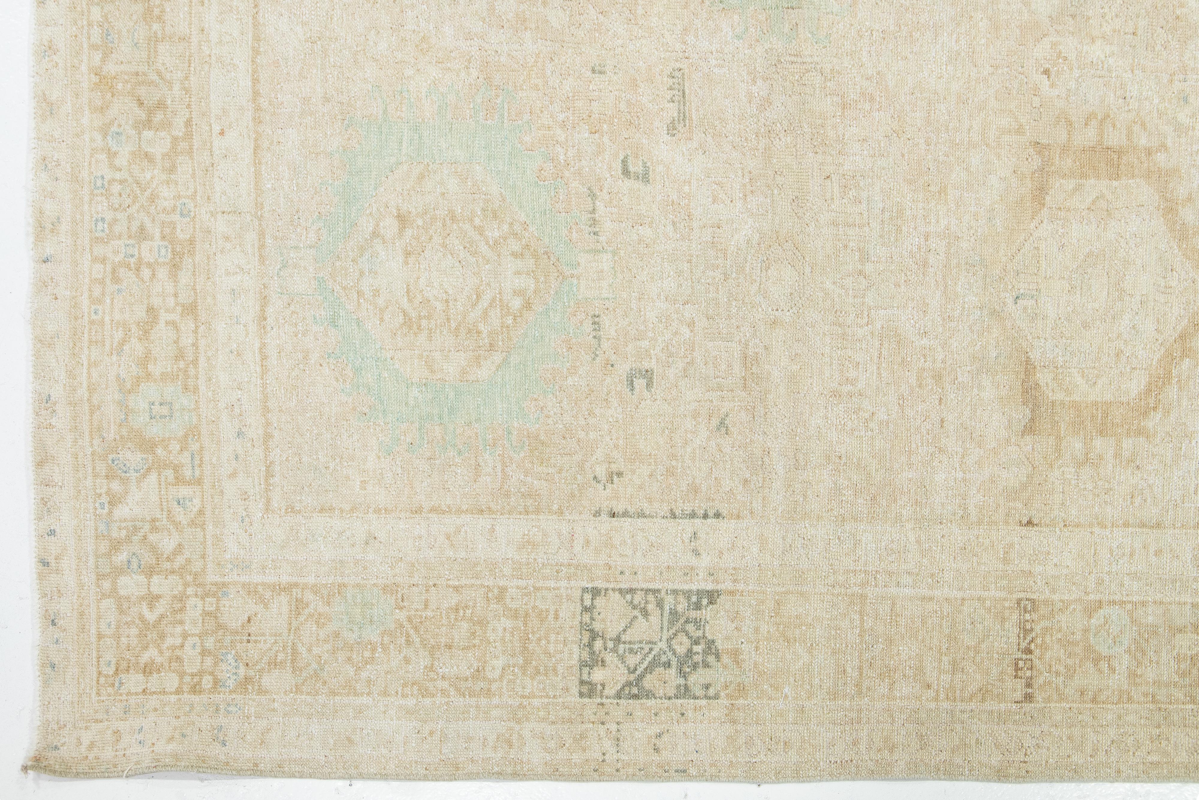 Heriz Serapi 1920s Antique Persian Heriz Beige Wool Rug With Allover Design For Sale