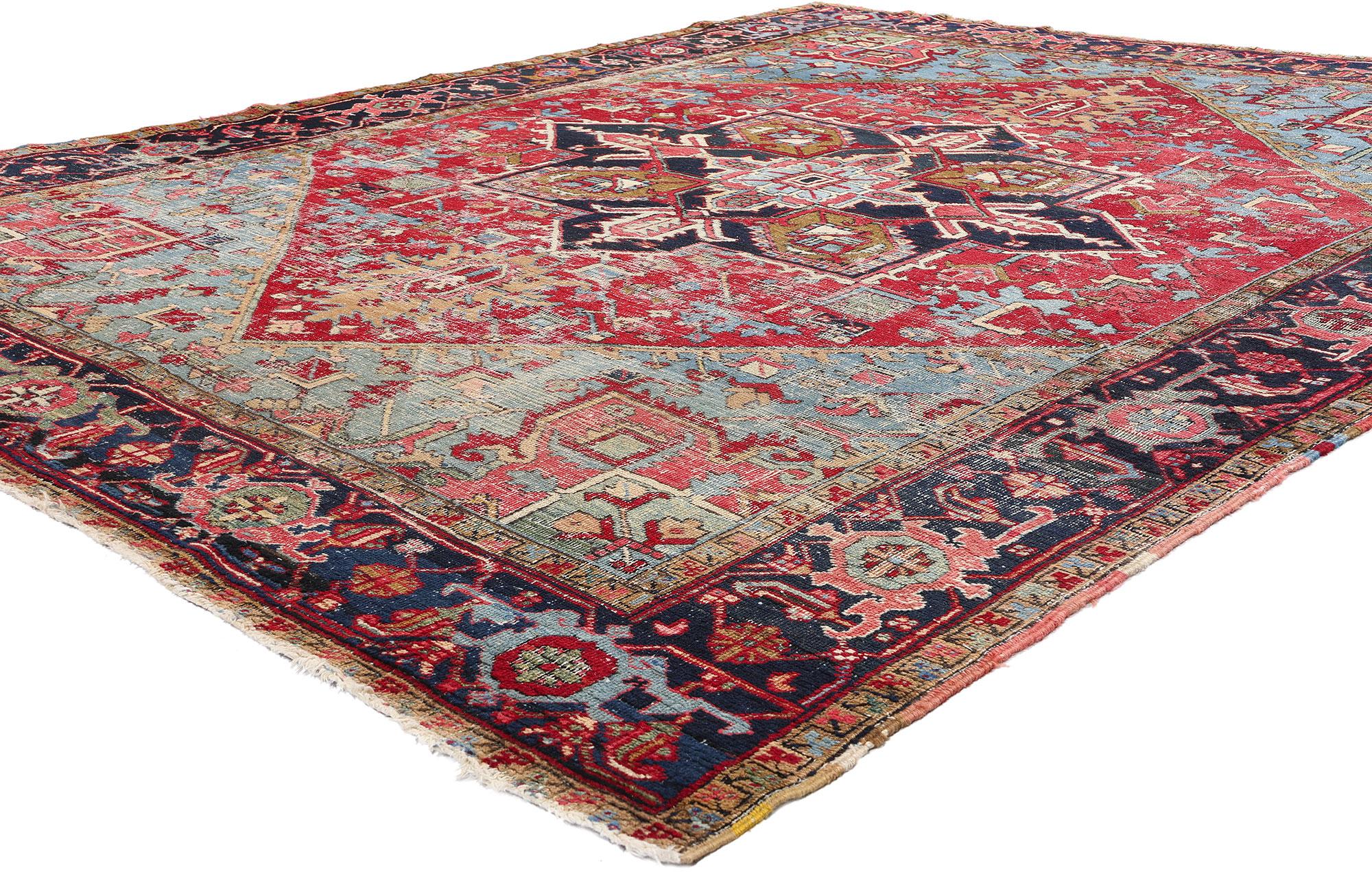 79129 Distressed Antique Persian Heriz Rug, 08'07 x 11'00. This hand-knotted wool distressed antique Persian Heriz rug exemplifies the time-honored traditions of master weavers from northwestern Iran. Crafted in the village of Heris, situated on the