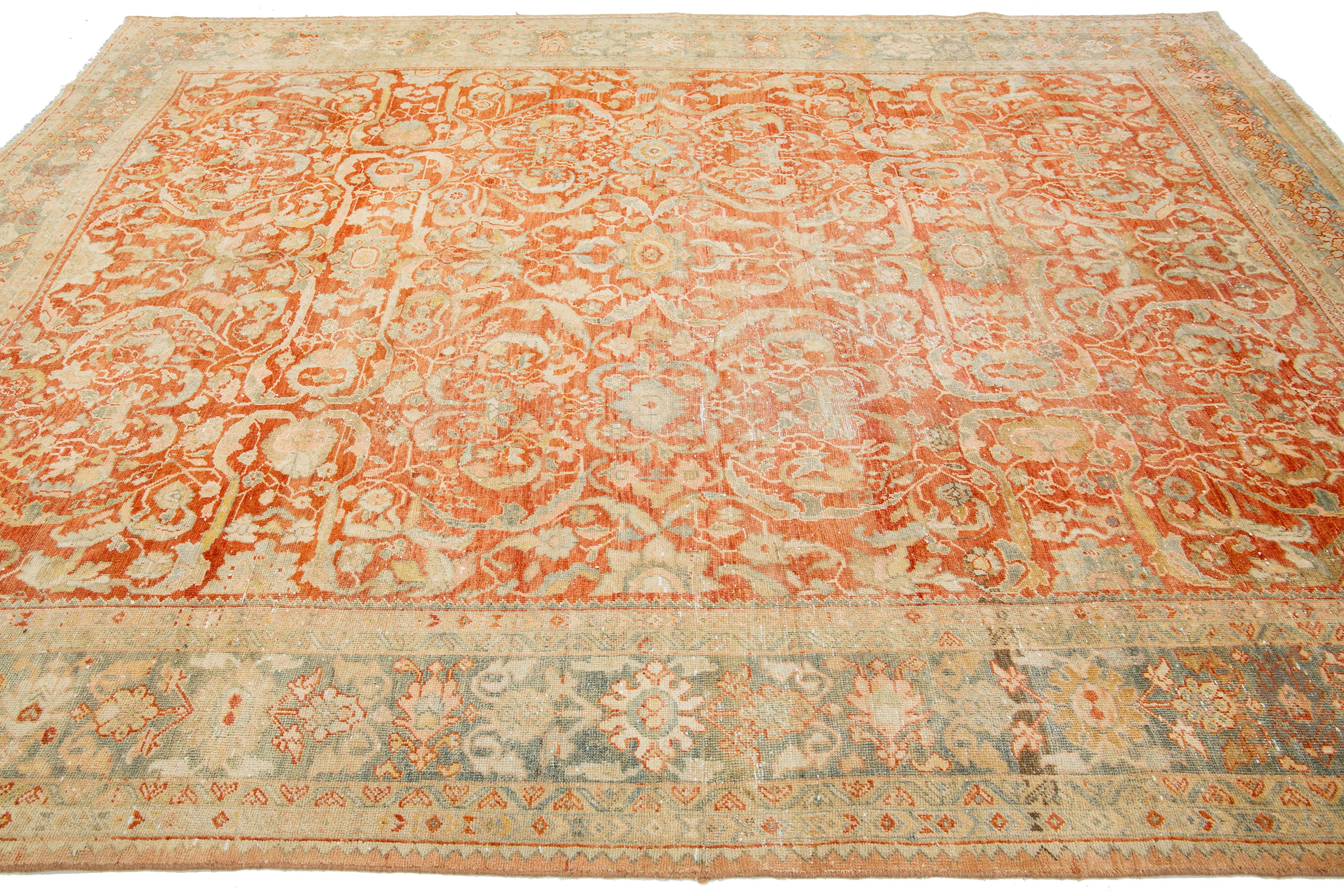 Early 20th Century 1920s Antique Persian Heriz Wool Rug In Rust With Allover Floral Design  For Sale