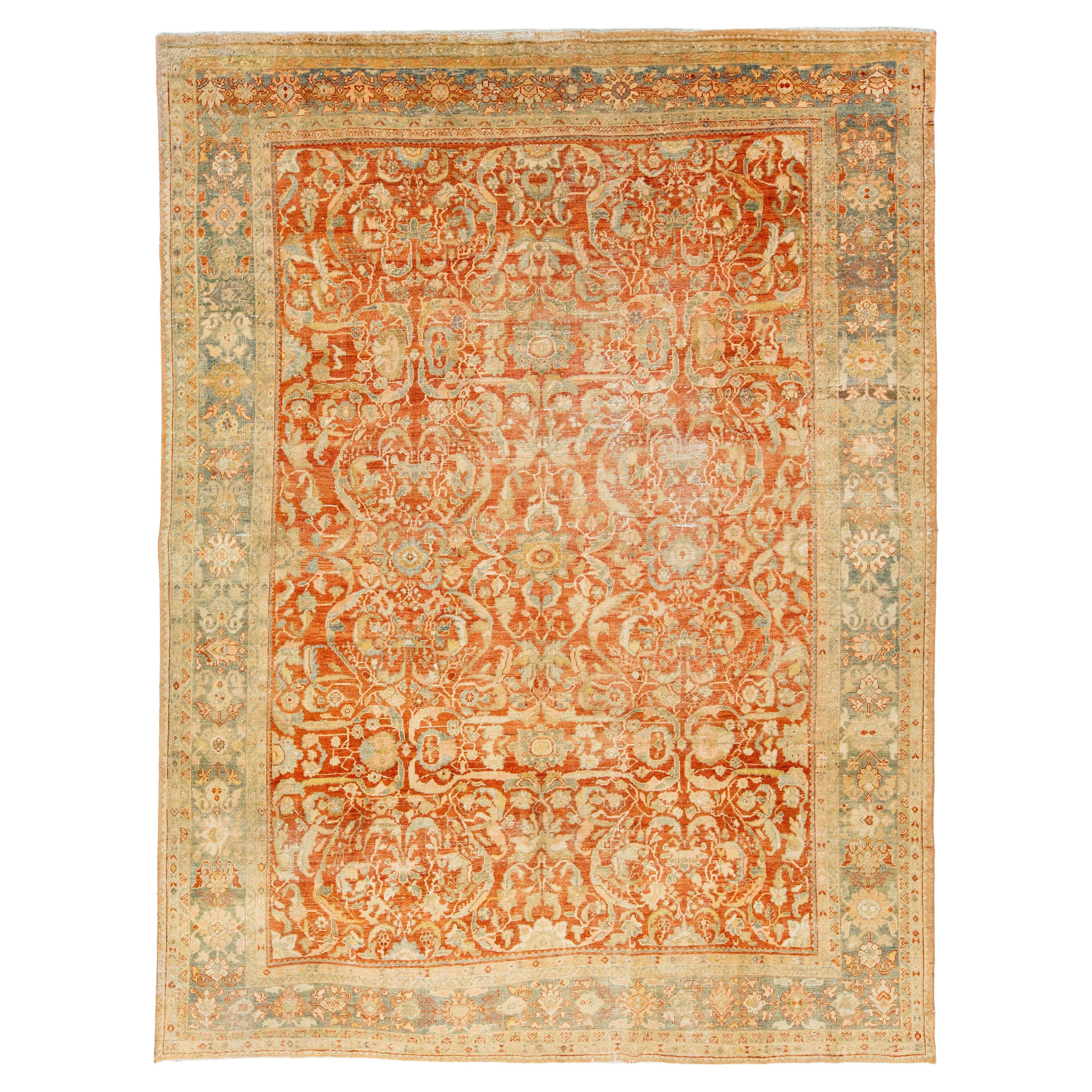 1920s Antique Persian Heriz Wool Rug In Rust With Allover Floral Design  For Sale