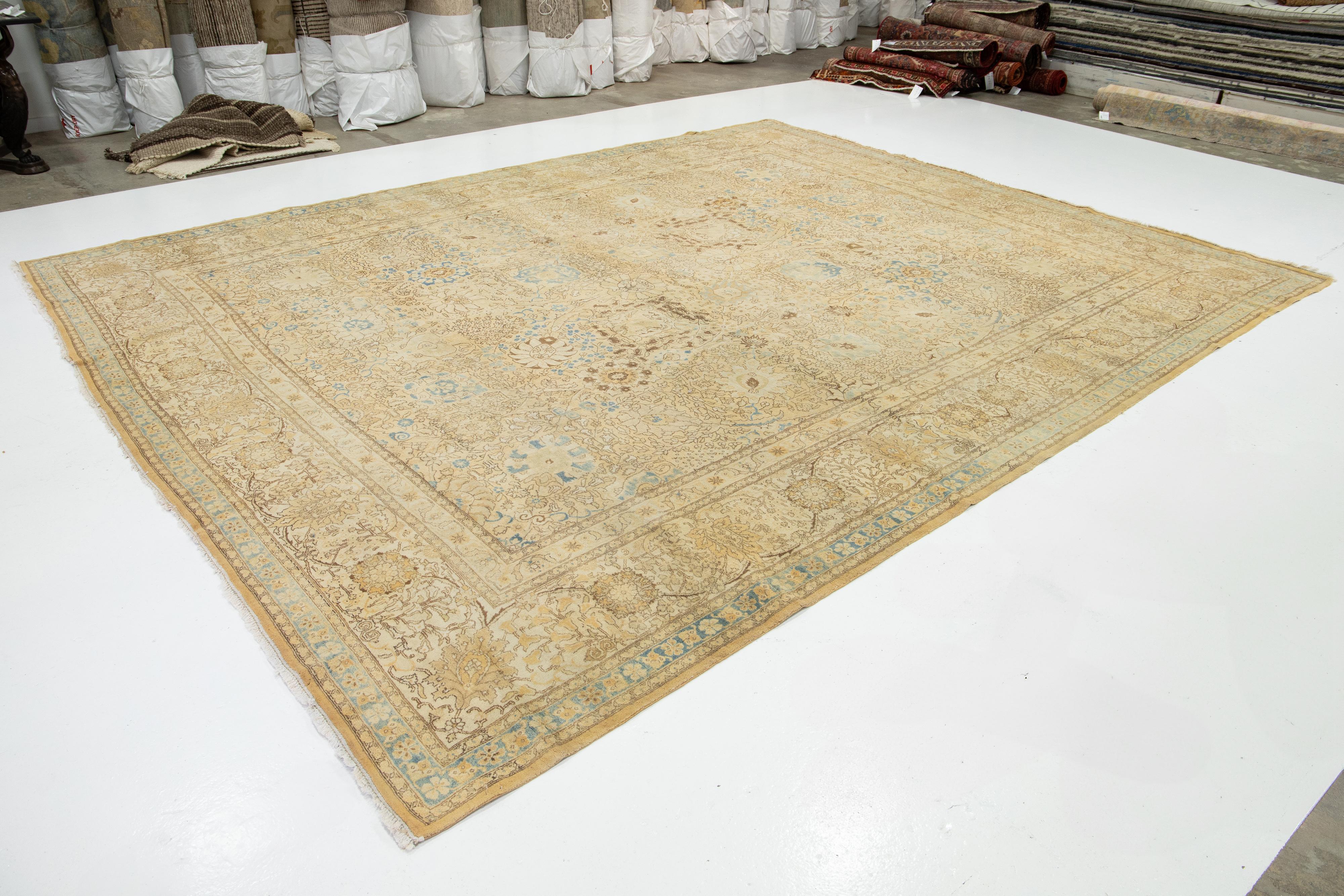 Hand-Knotted 1920s Antique Persian Tabriz Beige Wool Rug With Allover Floral Pattern For Sale