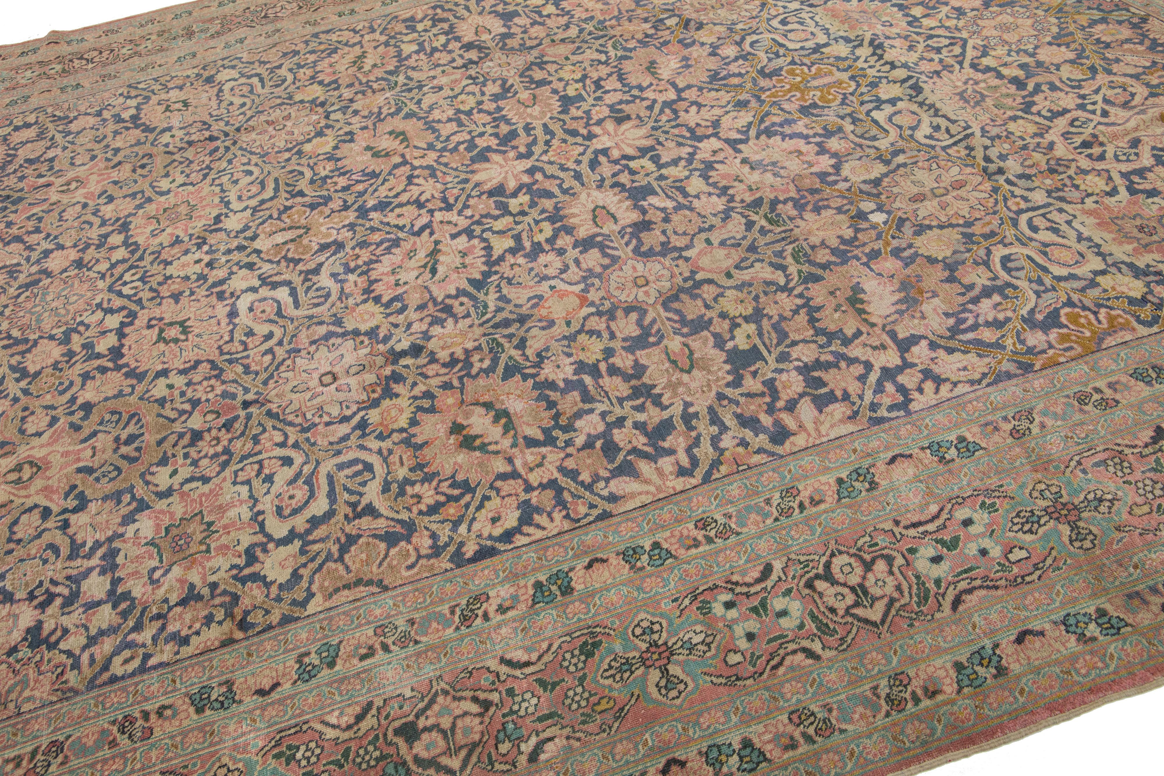 Hand-Knotted 1920s Antique Persian Tabriz Blue Wool Rug With Allover Floral Pattern For Sale