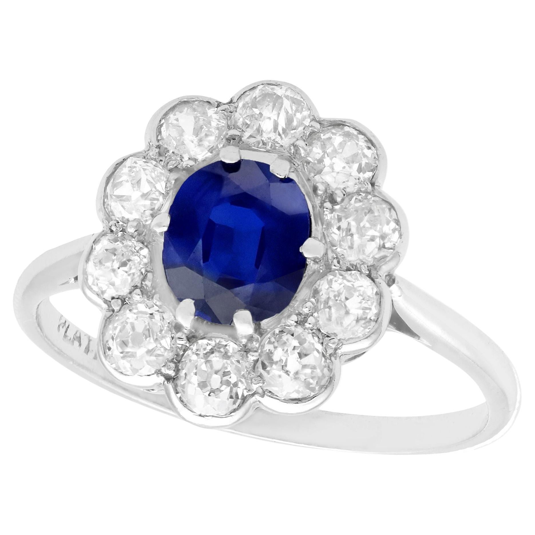 1920s Antique Sapphire and 1.15 Carat Diamond Platinum Cluster Engagement Ring