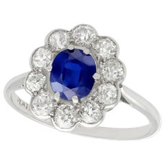 1920s Antique Sapphire and 1.15 Carat Diamond Platinum Cluster Ring
