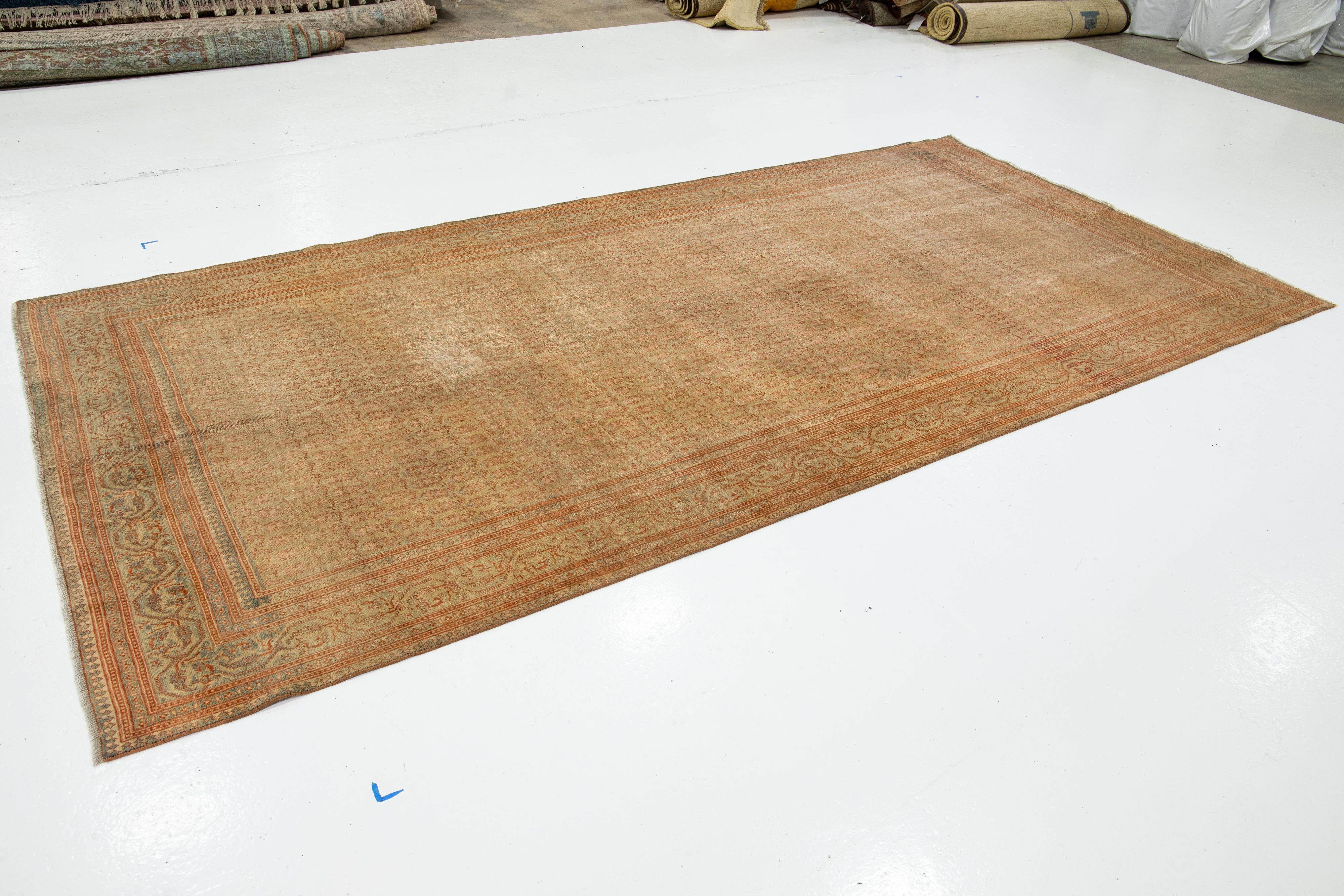 Hand-Knotted 1920s Antique Sivas Gallery Wool rug In Beige Tan Color With Allover Pattern For Sale