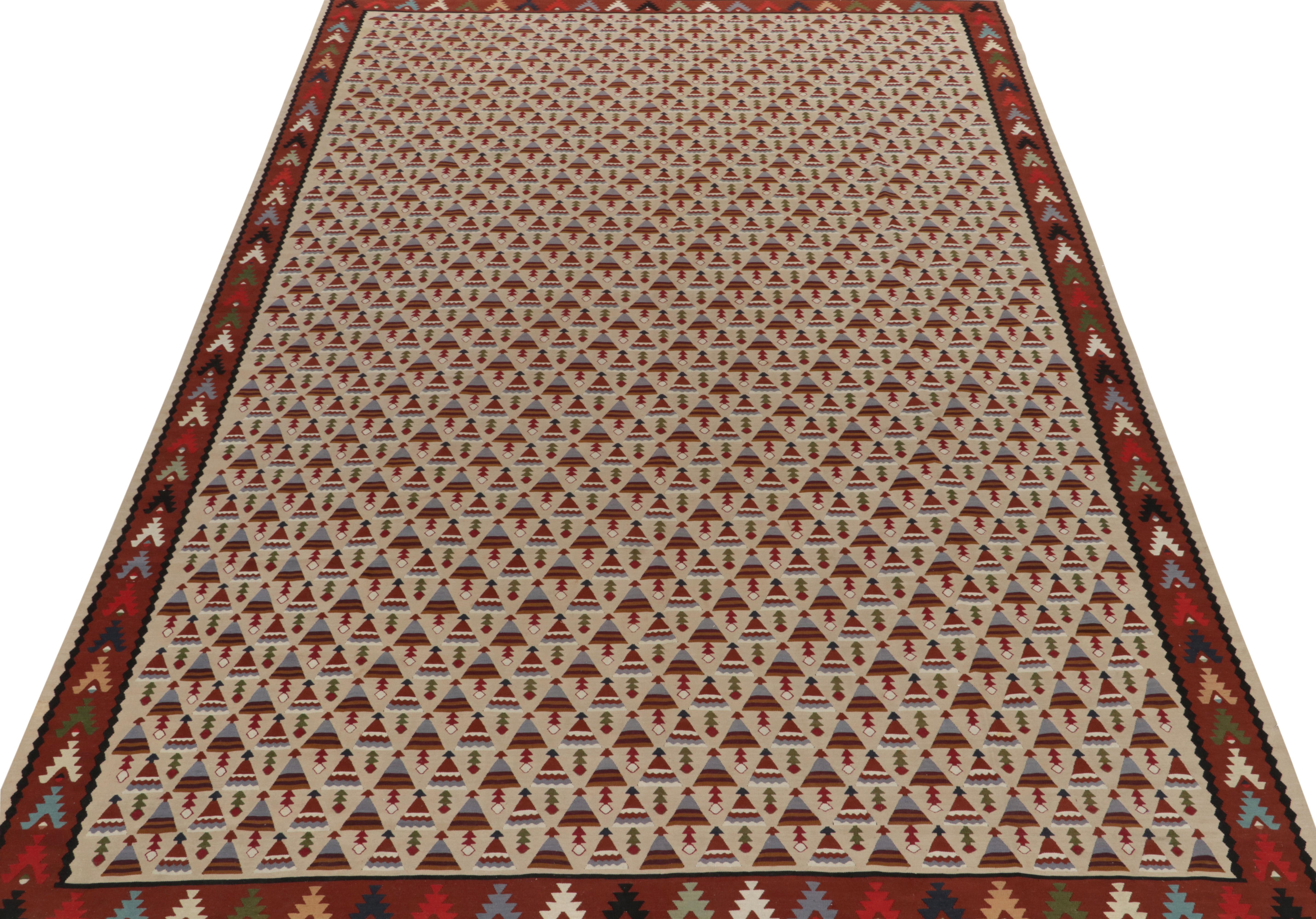 Handwoven in fine wool, a 10x14 antique Kilim rug from believed to be of rare Macedonian origin, circa 1920-1930. 

Exemplifying Folk Art in weaving, the piece reflects a unique sensibility in design with lesser-known motifs adorning field &