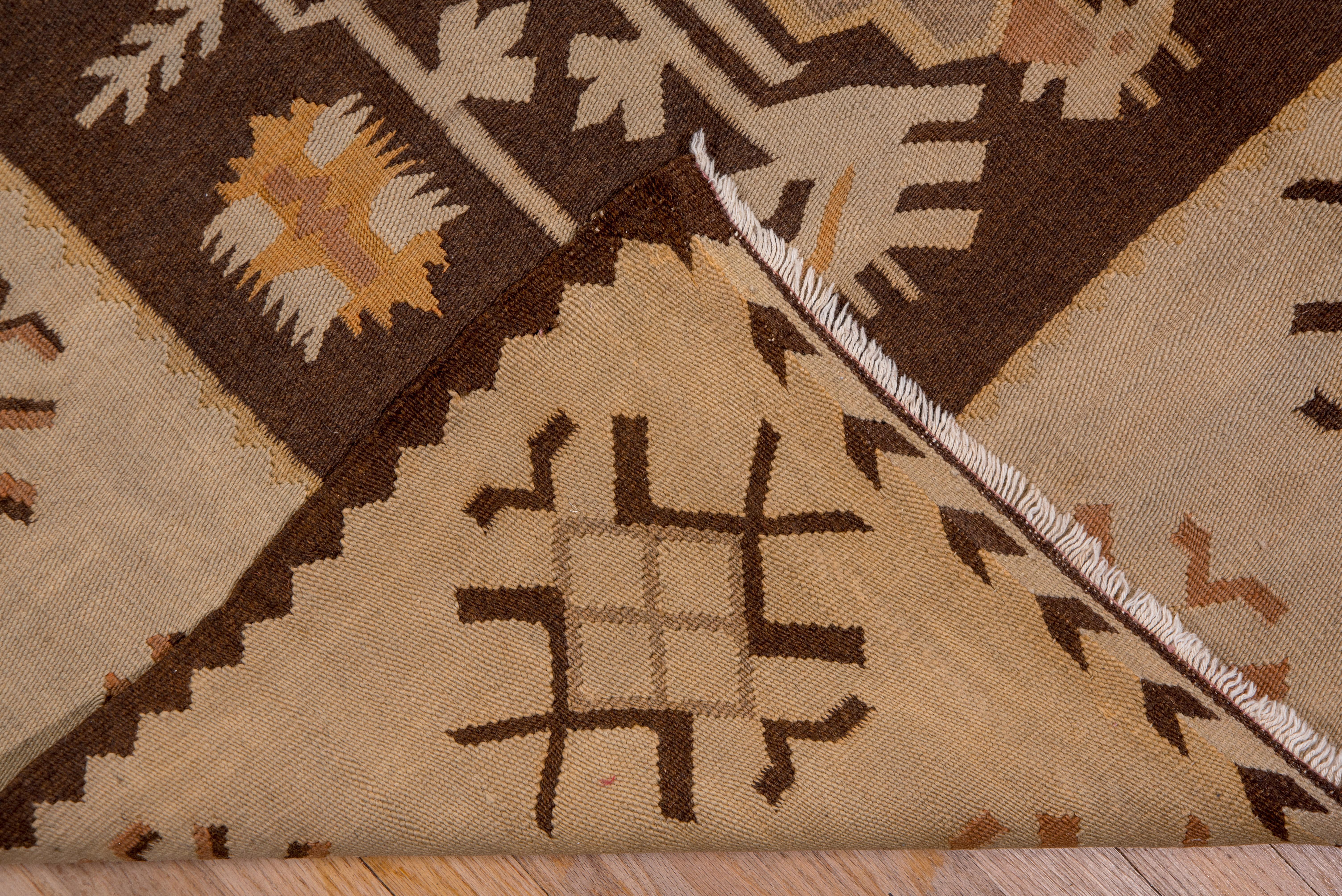 1920s Antique Turkish Kilim Rug, Allover Brown Field, Cream Borders In Good Condition For Sale In New York, NY