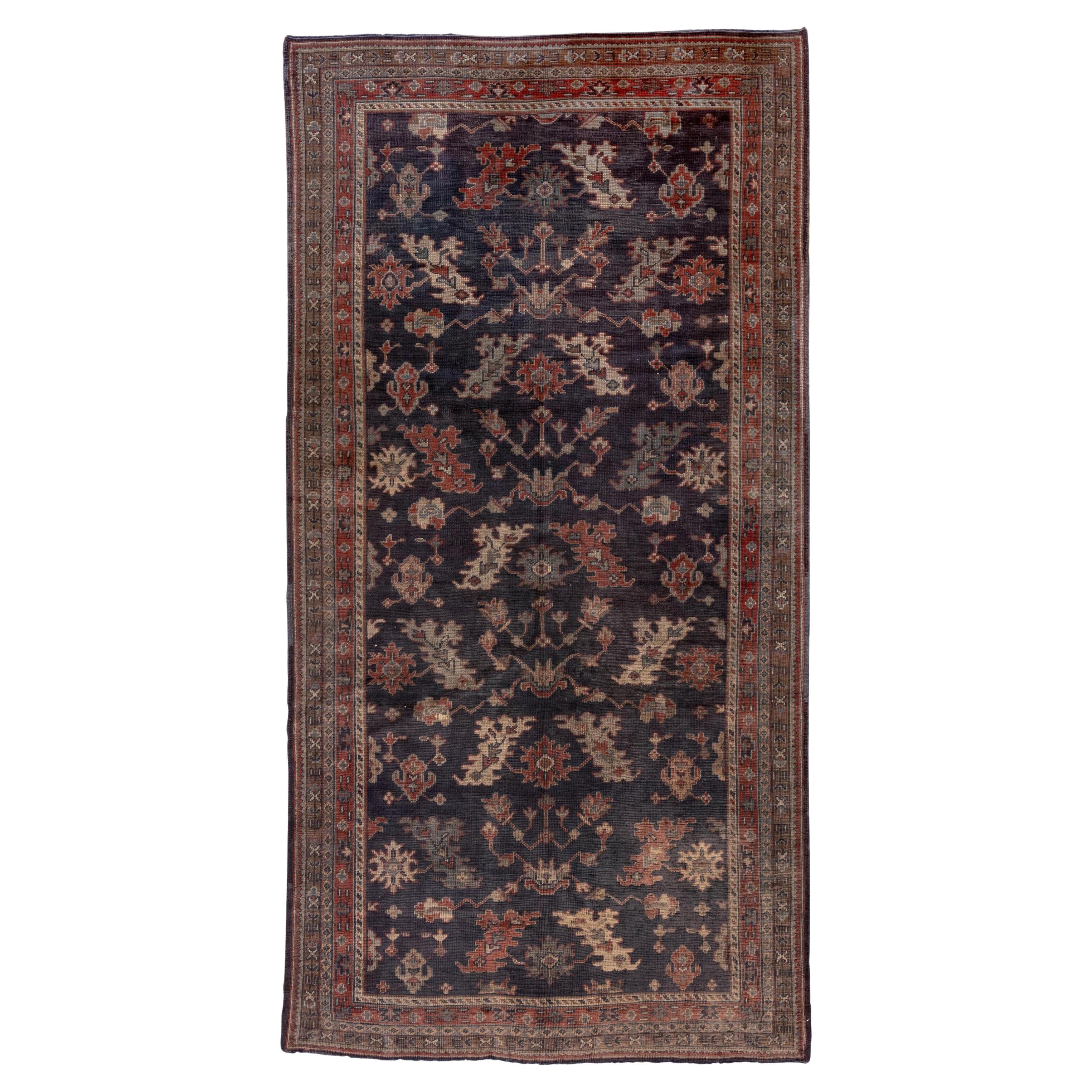 1920s Antique Turkish Oushak Gallery Rug, Navy Allover Field, Coral Borders For Sale