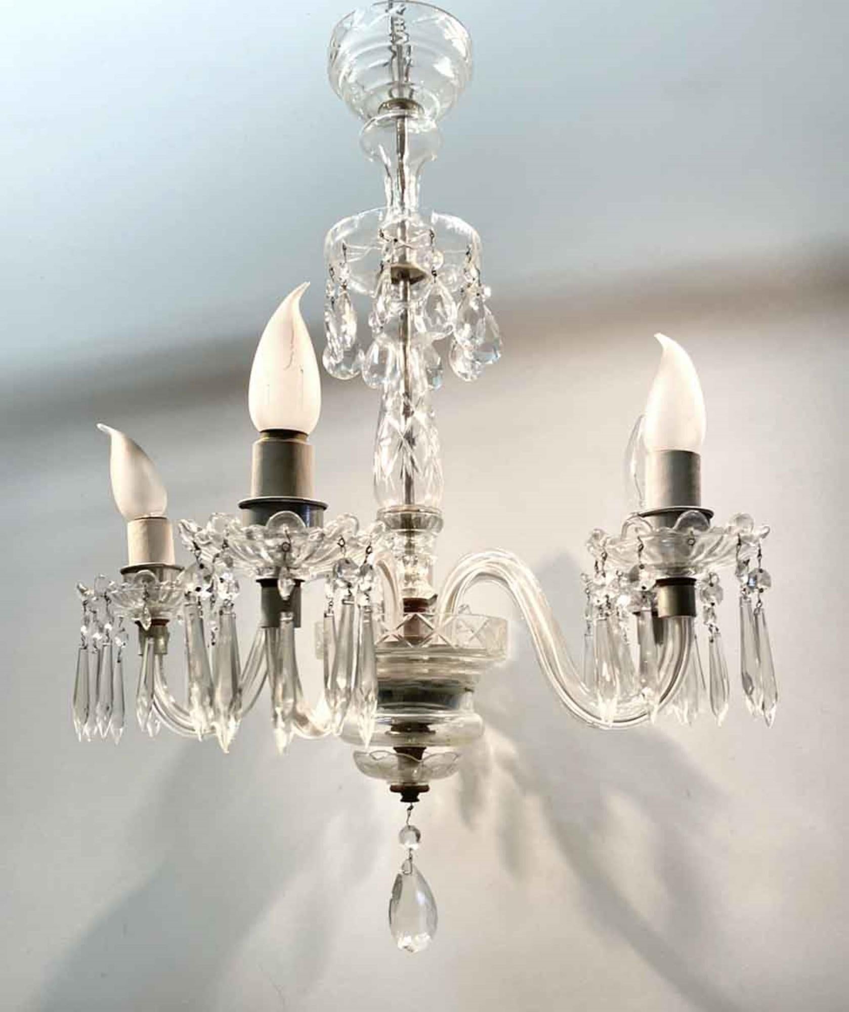 1920s antique Victorian style 5-arm crystal chandelier with glass arms and a simple design. Price includes restoration. This can be seen at our 400 Gilligan St location in Scranton. PA.