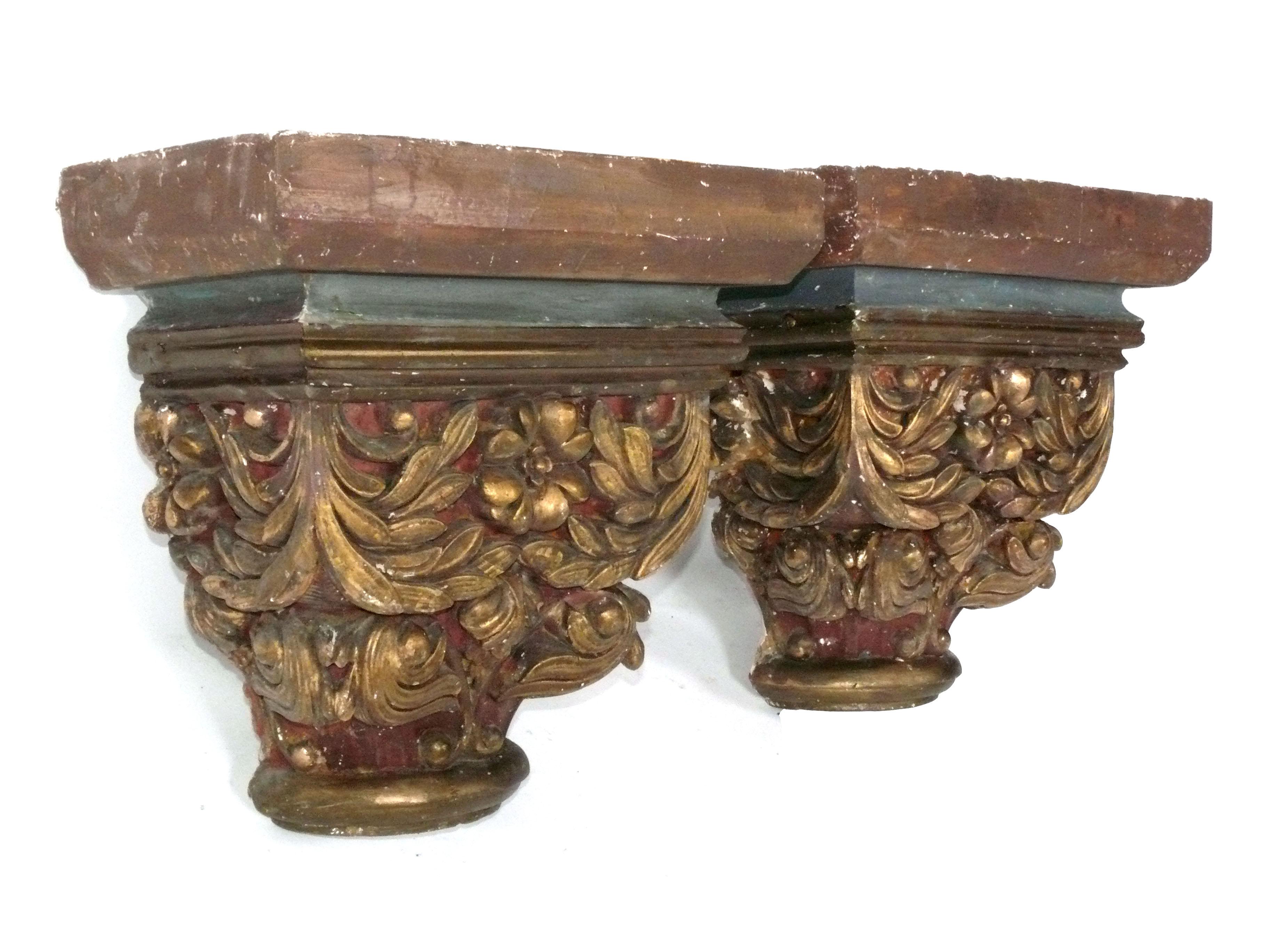 Pair of Plaster Sconces Made from 1920s Plaster Architectural Elements, American, circa 1920s. They have recently been wired and had a mounting armature built inside them, and they are ready to be wall mounted. They are large scale, measuring 19