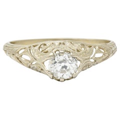 1920
s Art Deco 0.48 Carat Diamond 18 Karat White Gold Foliate Engagement Ring