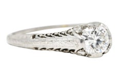 1920's Art Deco 0.55 Carat Diamond Platinum Filigree Engagement Ring