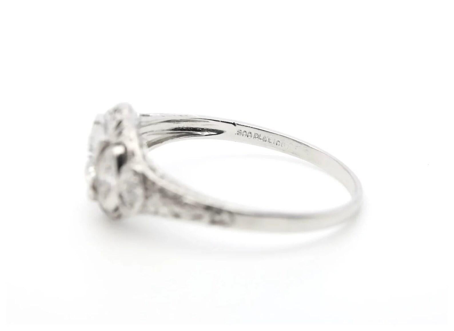 1920’s Art Deco 0.72ctw Platinum Diamond Filigree Engagement Ring In Good Condition For Sale In Boston, MA