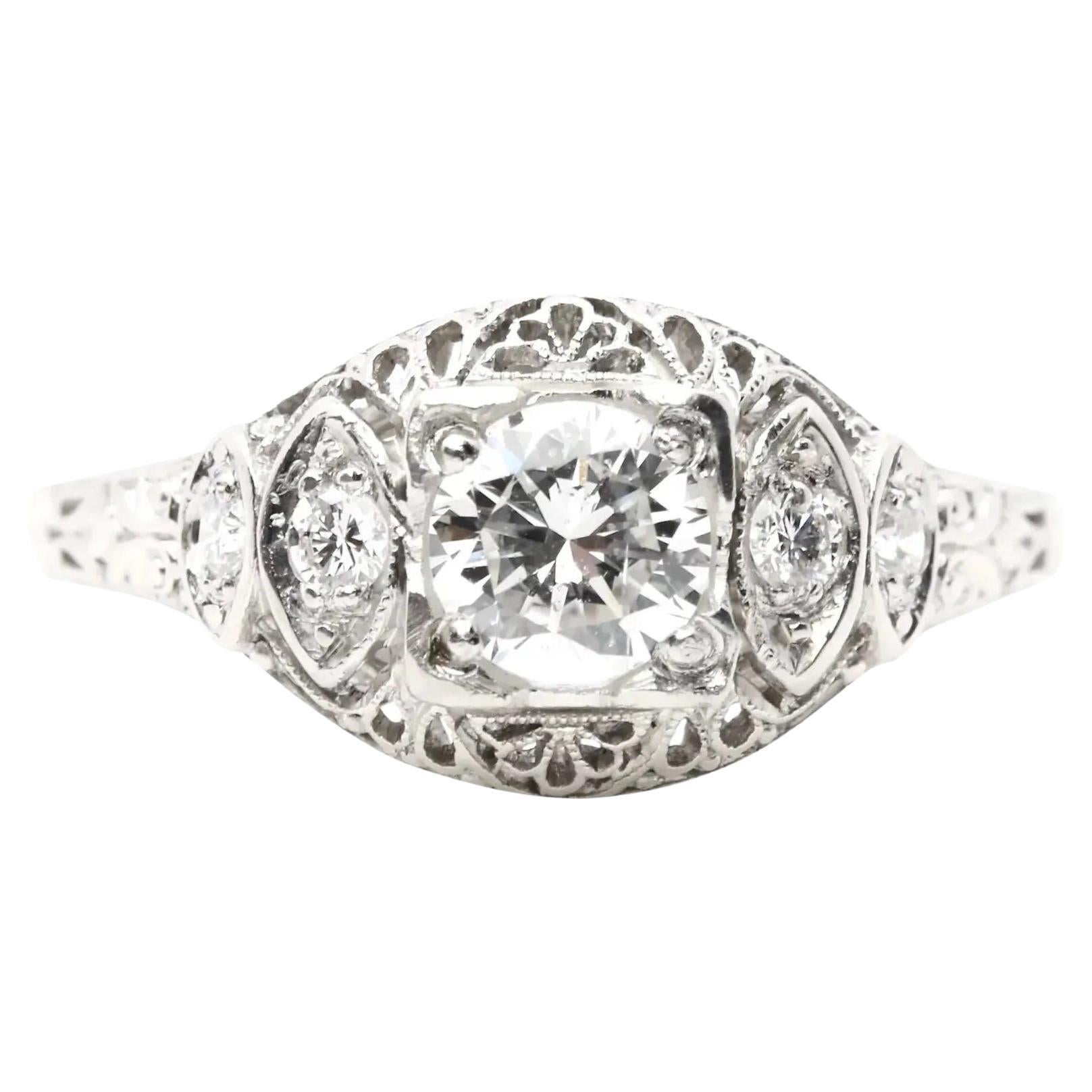 1920’s Art Deco 0.72ctw Platinum Diamond Filigree Engagement Ring For Sale