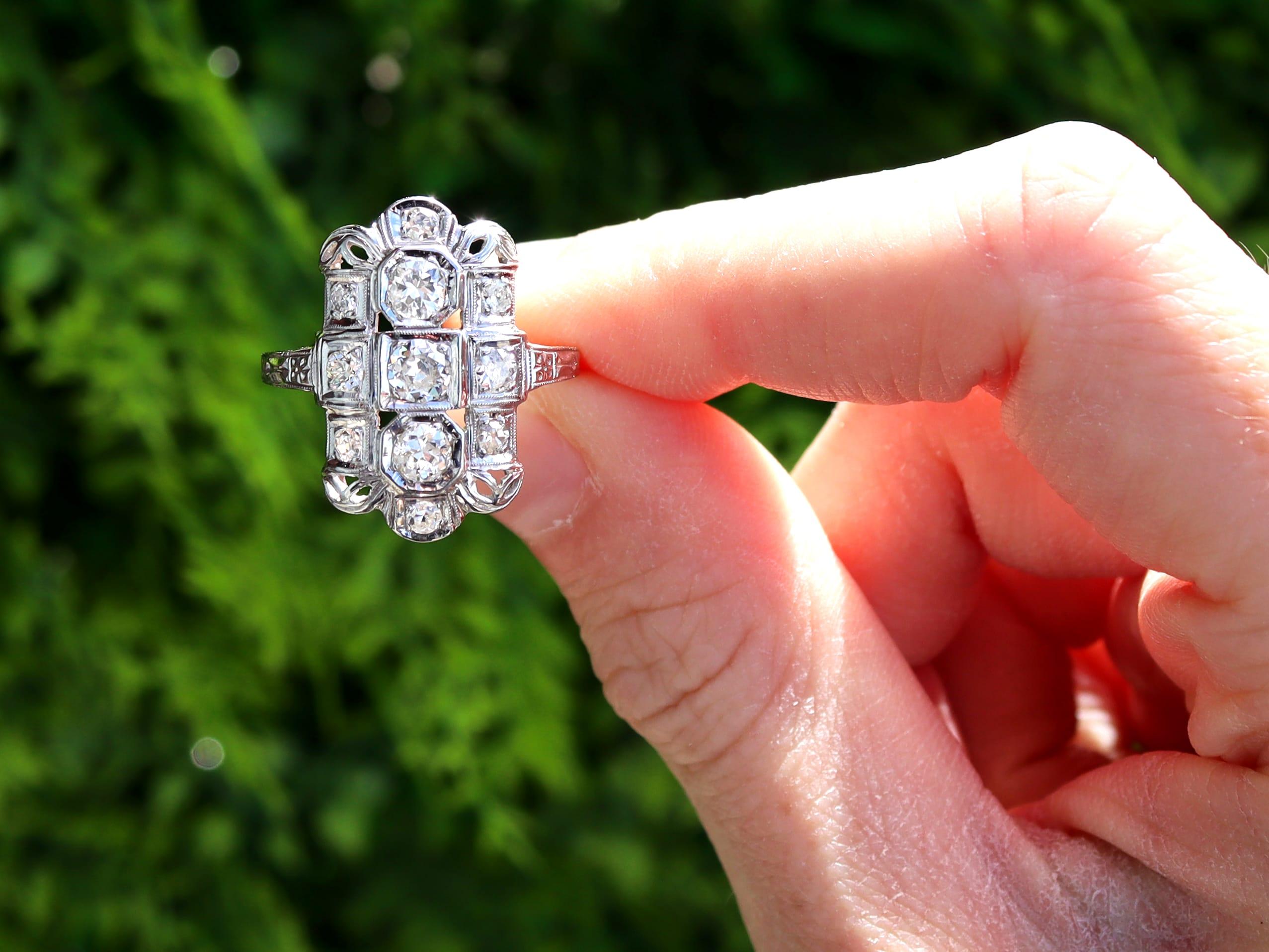 A stunning, fine and impressive antique 1.14 carat diamond and 18 karat white gold dress ring; part of our diverse 1920s diamond jewellery collection.

This stunning, fine and impressive vintage diamond ring has been crafted in 18k white gold.

The