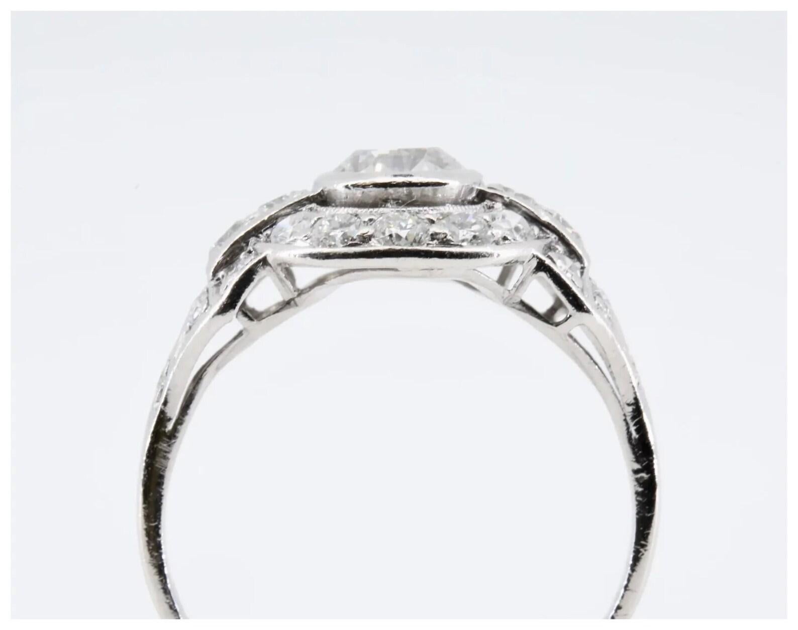 1920's Art Deco 1.46 Ctw Diamond Halo Engagement Ring in Platinum In Good Condition For Sale In Boston, MA