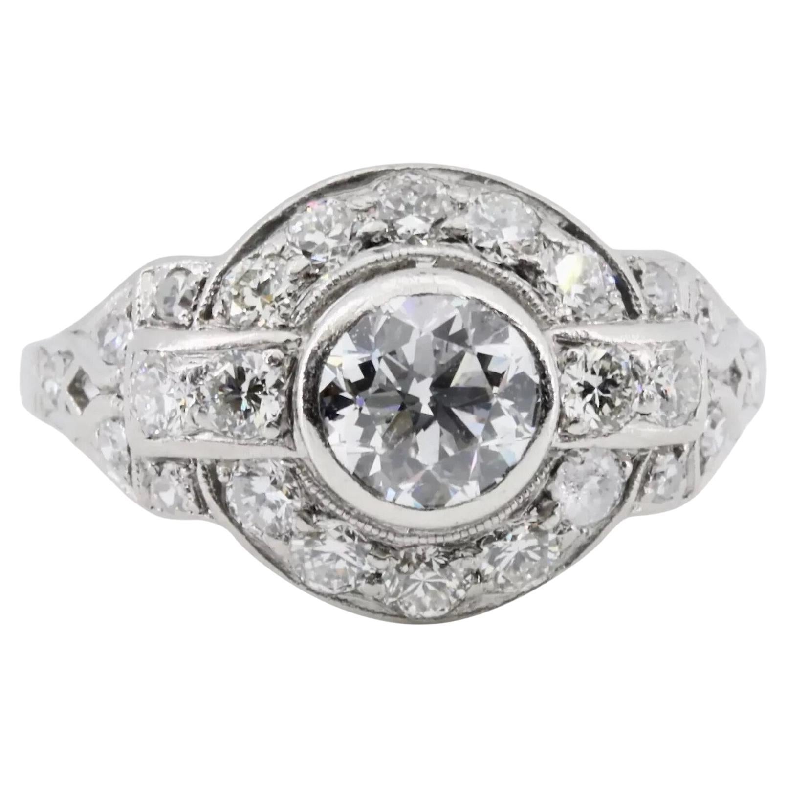 1920's Art Deco 1.46 Ctw Diamond Halo Engagement Ring in Platinum For Sale