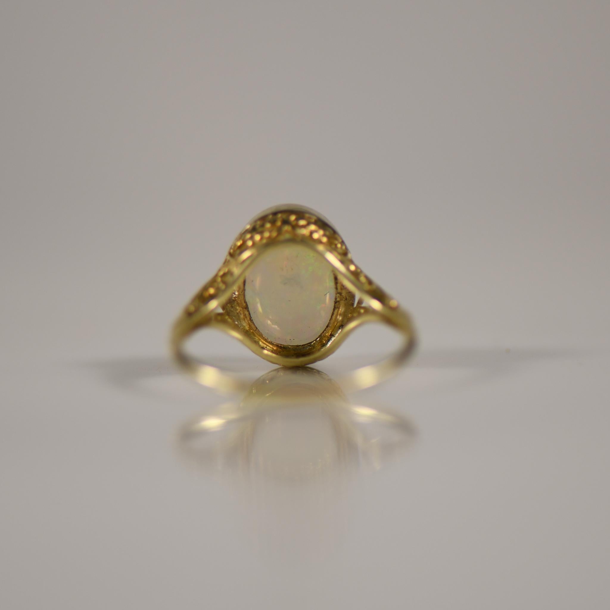 Women's 1920's Art Deco 14K Two Tone Bezel Set 4.5ct Oval Opal Cabochon Solitaire Ring For Sale