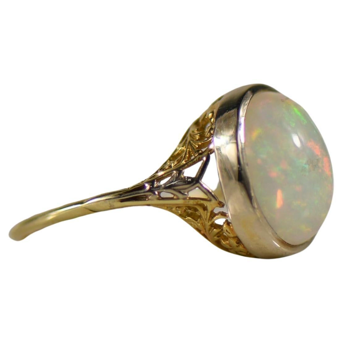 1920's Art Deco 14K Two Tone Bezel Set 4.5ct Oval Opal Cabochon Solitaire Ring For Sale