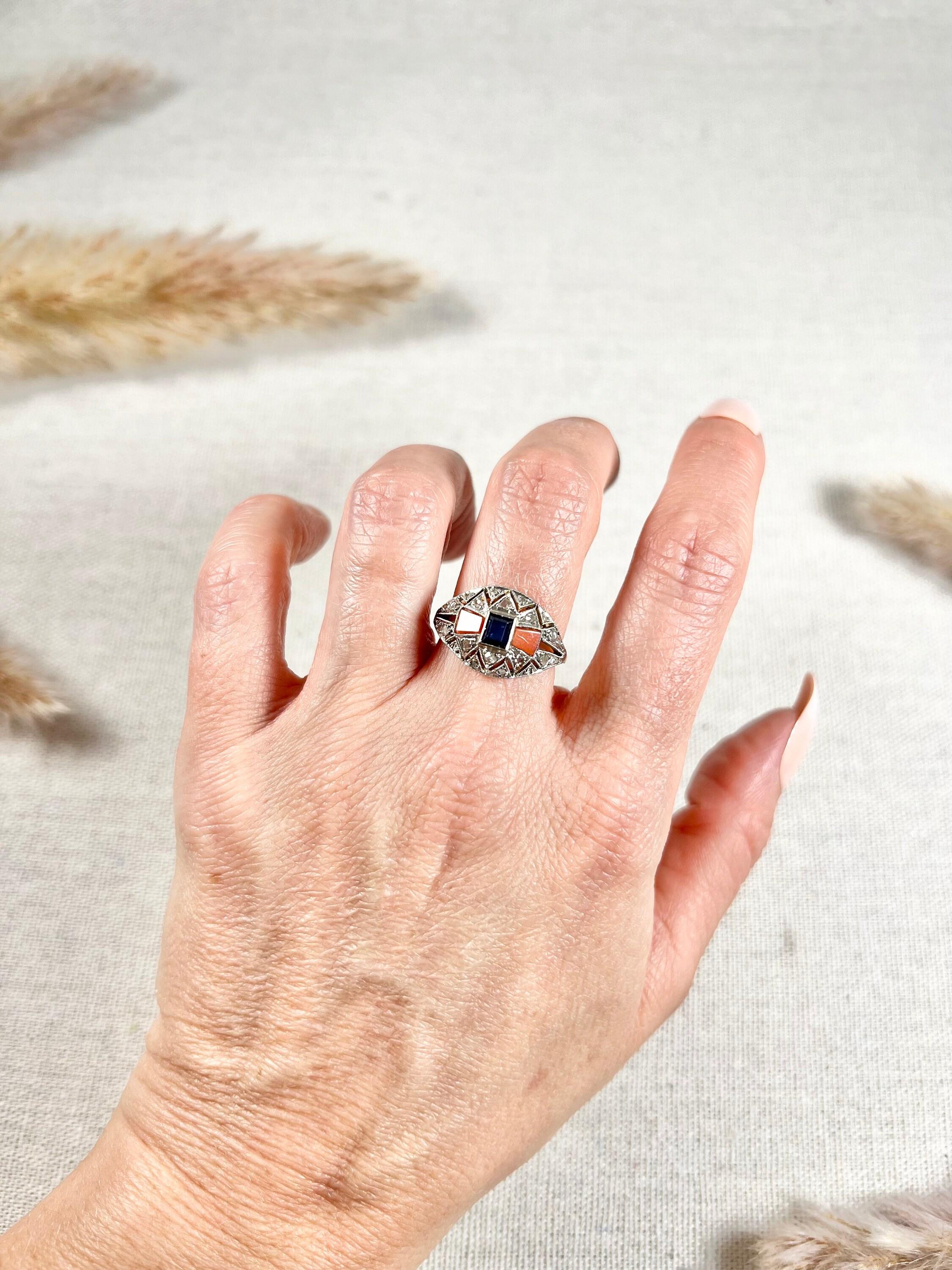 Antique Cocktail Ring

18ct Gold  & Platinum French Stamped- The owl and the Mascaron hallmark of the head of the bearded man. 

Circa 1920s

This stunning 1920s cocktail ring is a true masterpiece. The dome-shaped design rests elegantly across the