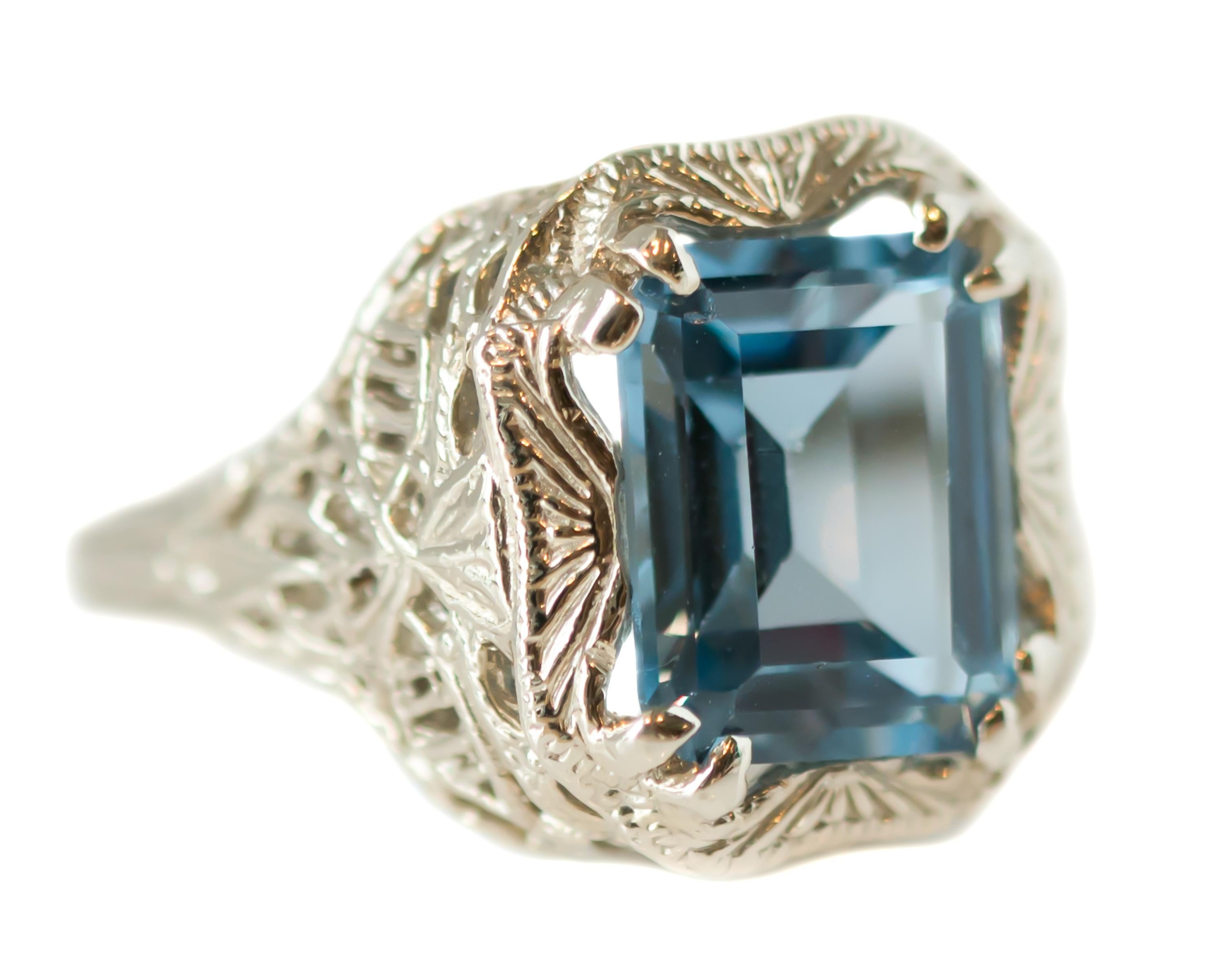 Emerald Cut 1920s Art Deco 3 Carat Blue Topaz and 14 Karat White Gold Filigree Ring