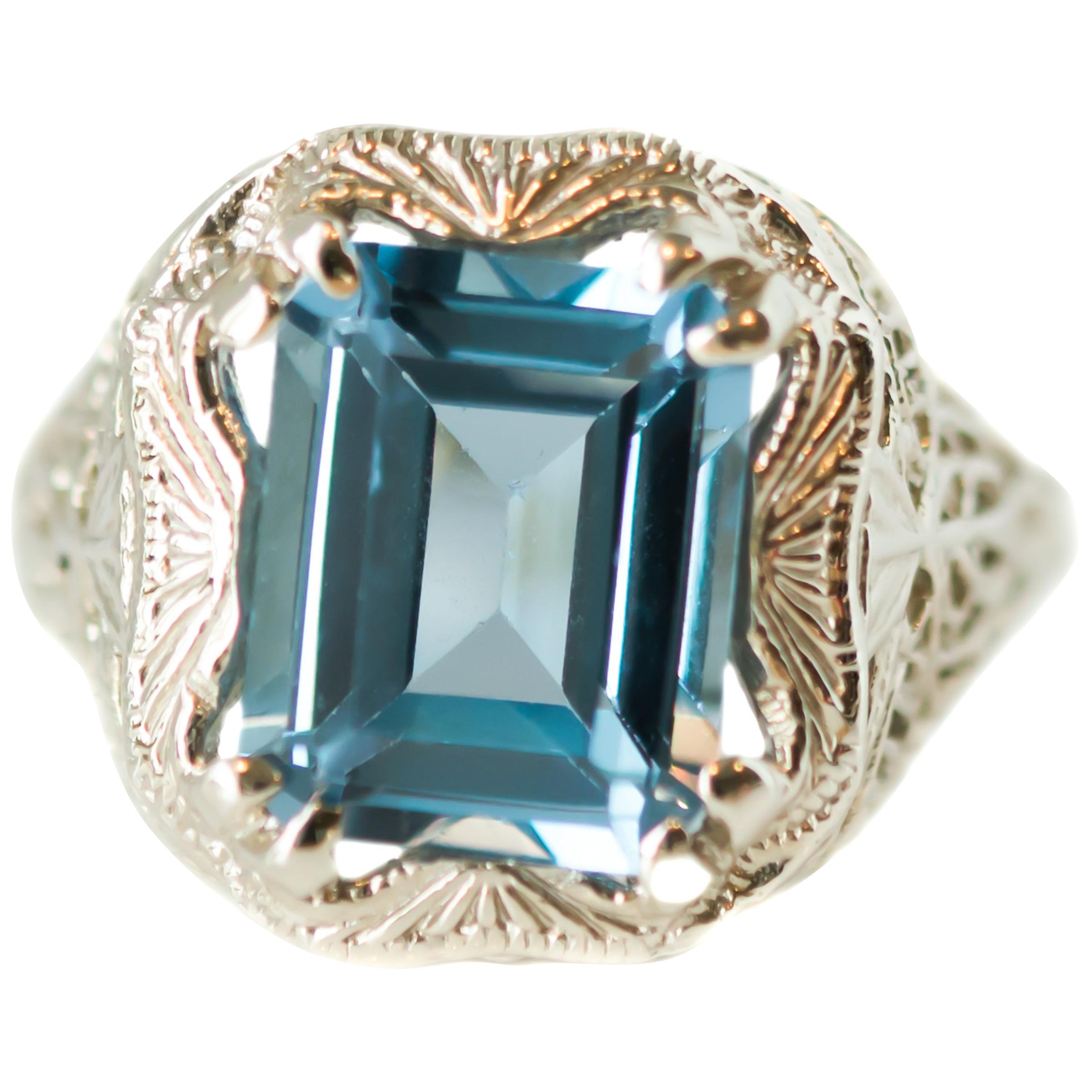1920s Art Deco 3 Carat Blue Topaz and 14 Karat White Gold Filigree Ring