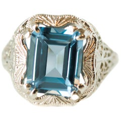 1920s Art Deco 3 Carat Blue Topaz and 14 Karat White Gold Filigree Ring
