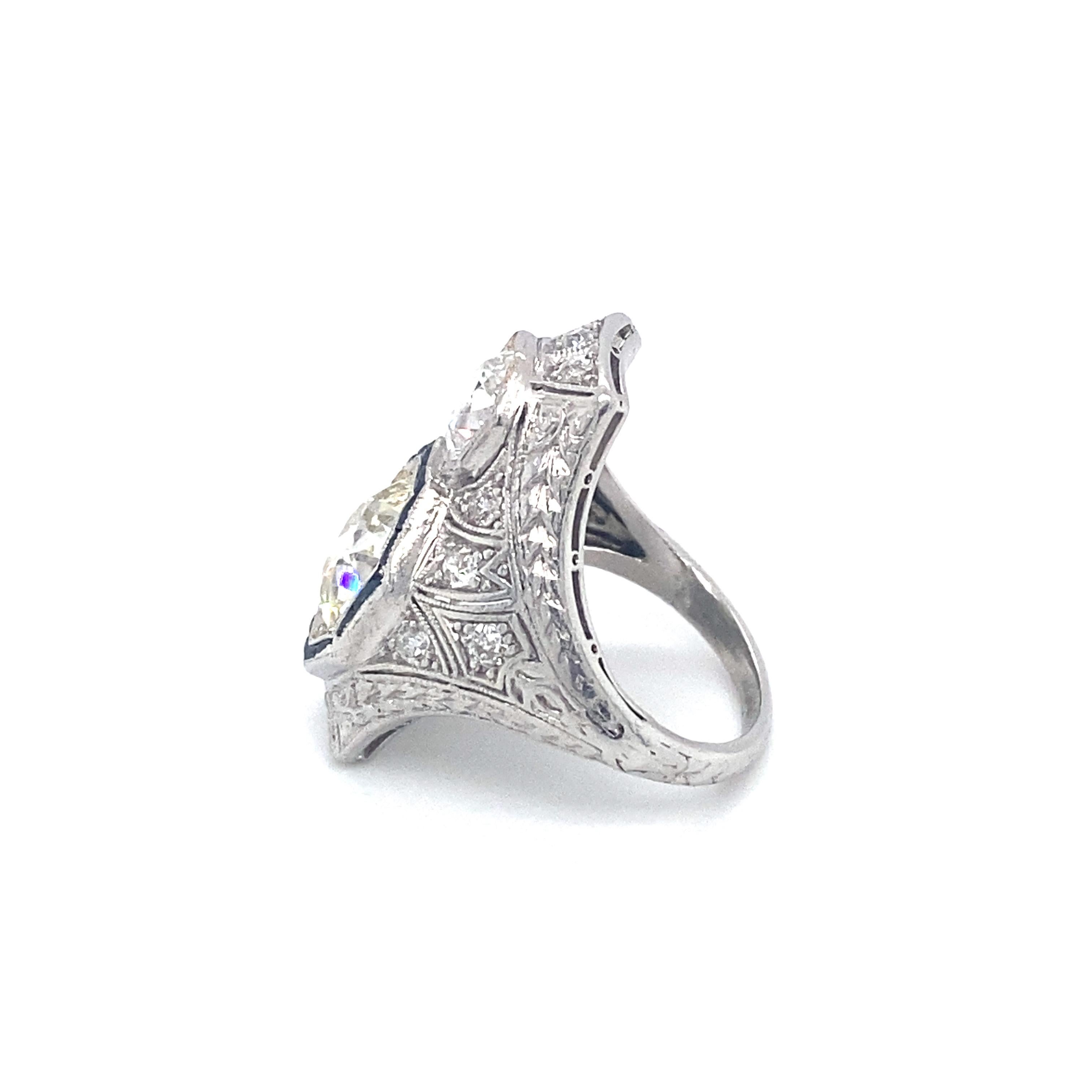 Item Details: This spectacular ring has a large 2.50 Carat Old European cut diamond with approximately 1.20 carats of accent diamonds and sapphires. It is ornate, exquisite and bold! Platinum crafted, it is a great example of the design from the