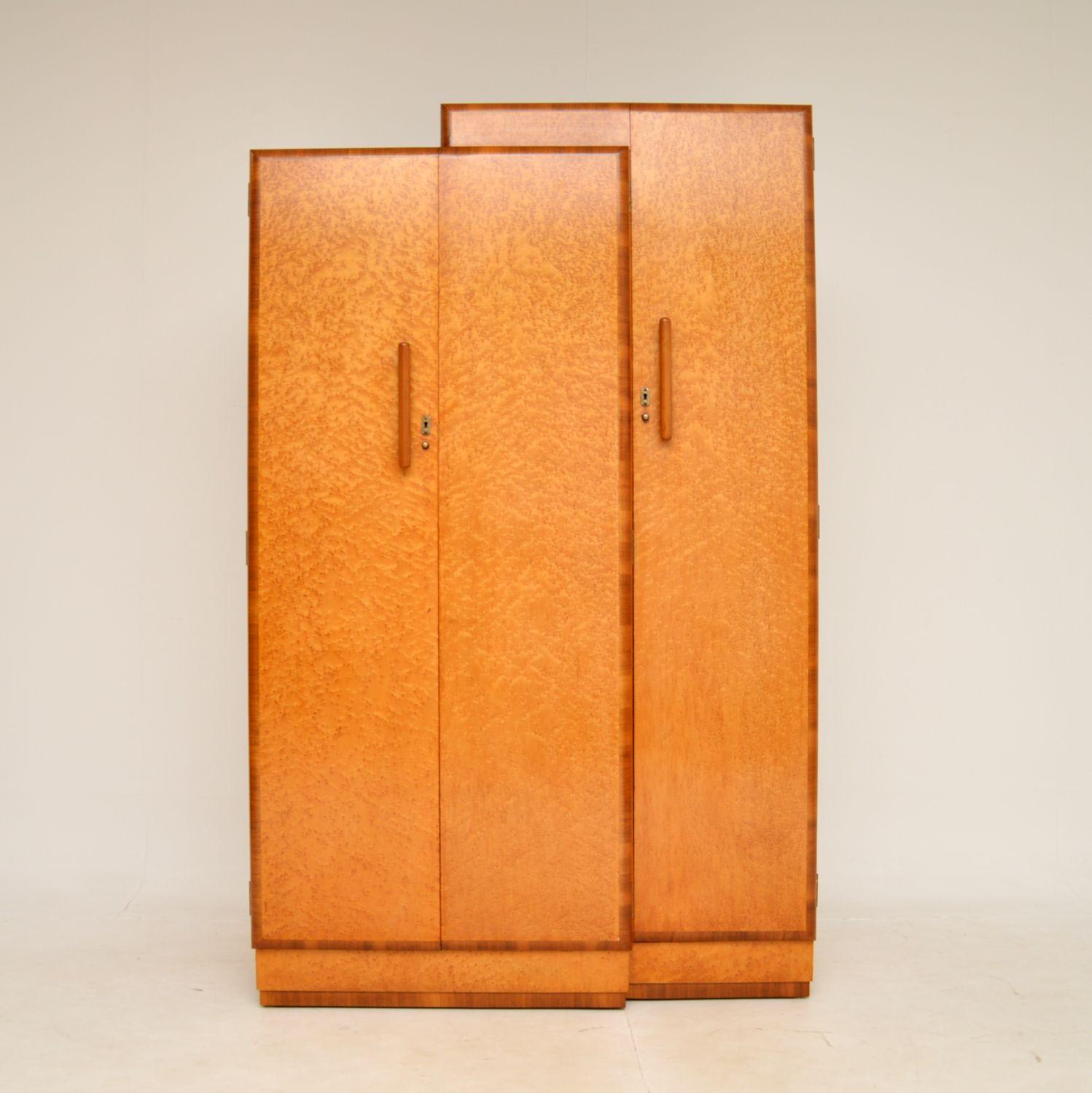 A spectacular original Art Deco birds eye maple and walnut wardrobe. This was made in England, it dates from the 1920-30’s.

This is one of the most unusual and stylish wardrobes of the period we have ever come across. It is beautifully designed and
