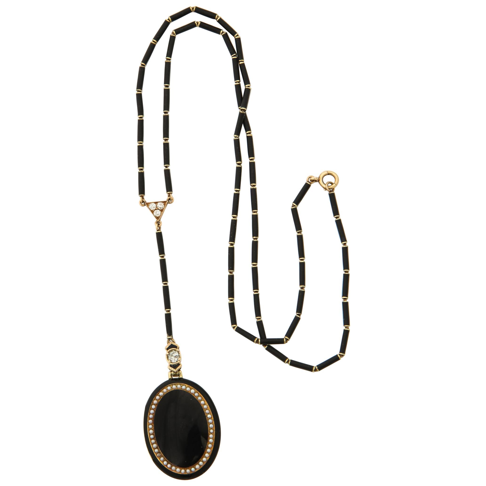1920s Art Deco Black Enamel with Seed Pearls and Diamonds Gold Locket Necklace For Sale