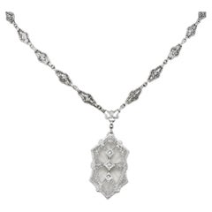 1920's Art Deco Camphor Glass Diamond 14 Karat White Gold Drop Necklace