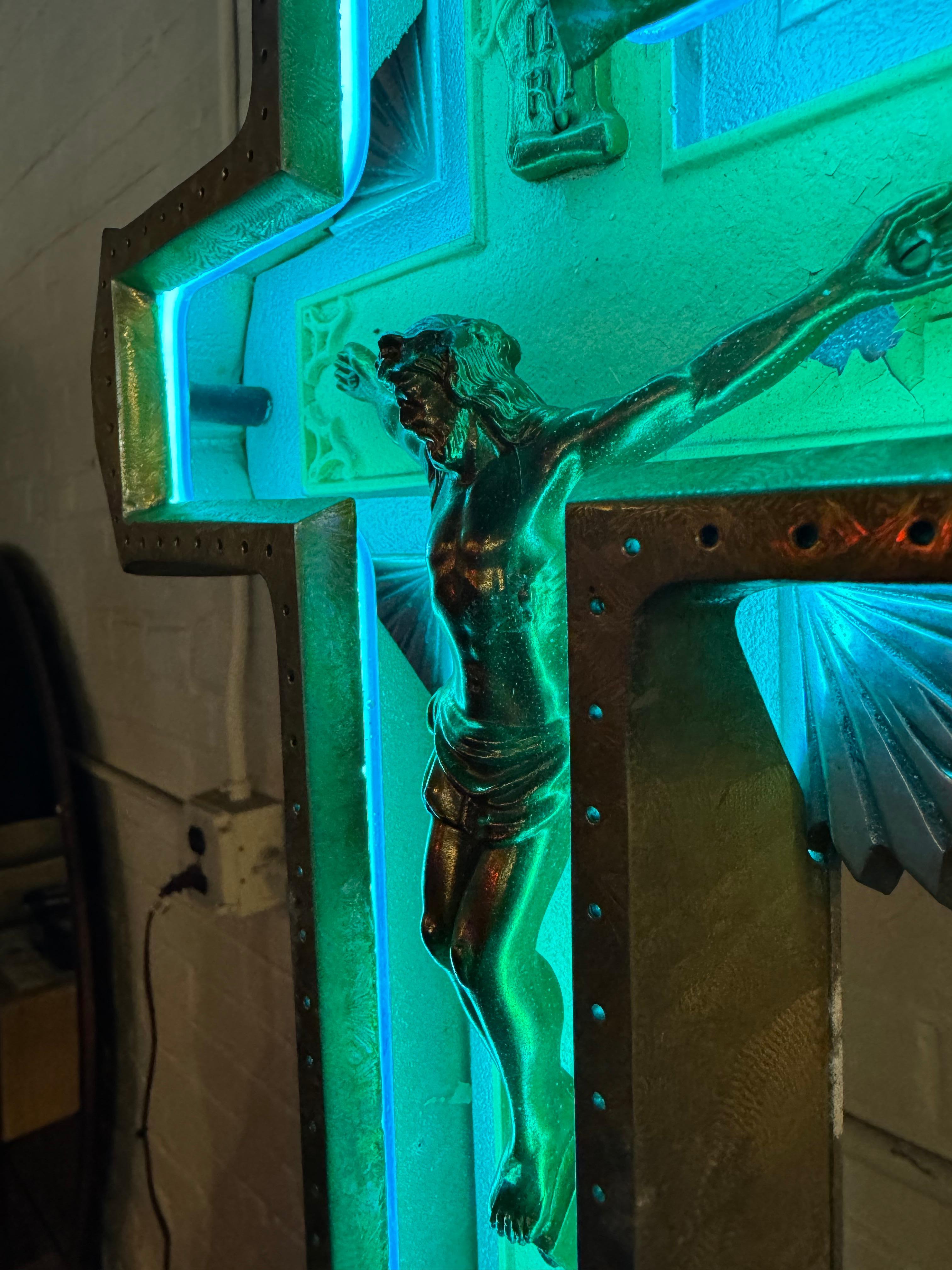 1920s Art Deco Cast Aluminum and Neon Crucifix.Beautiful original blue neon cross,, Christ figure retains its original patina,,Retains original adjustable stand.