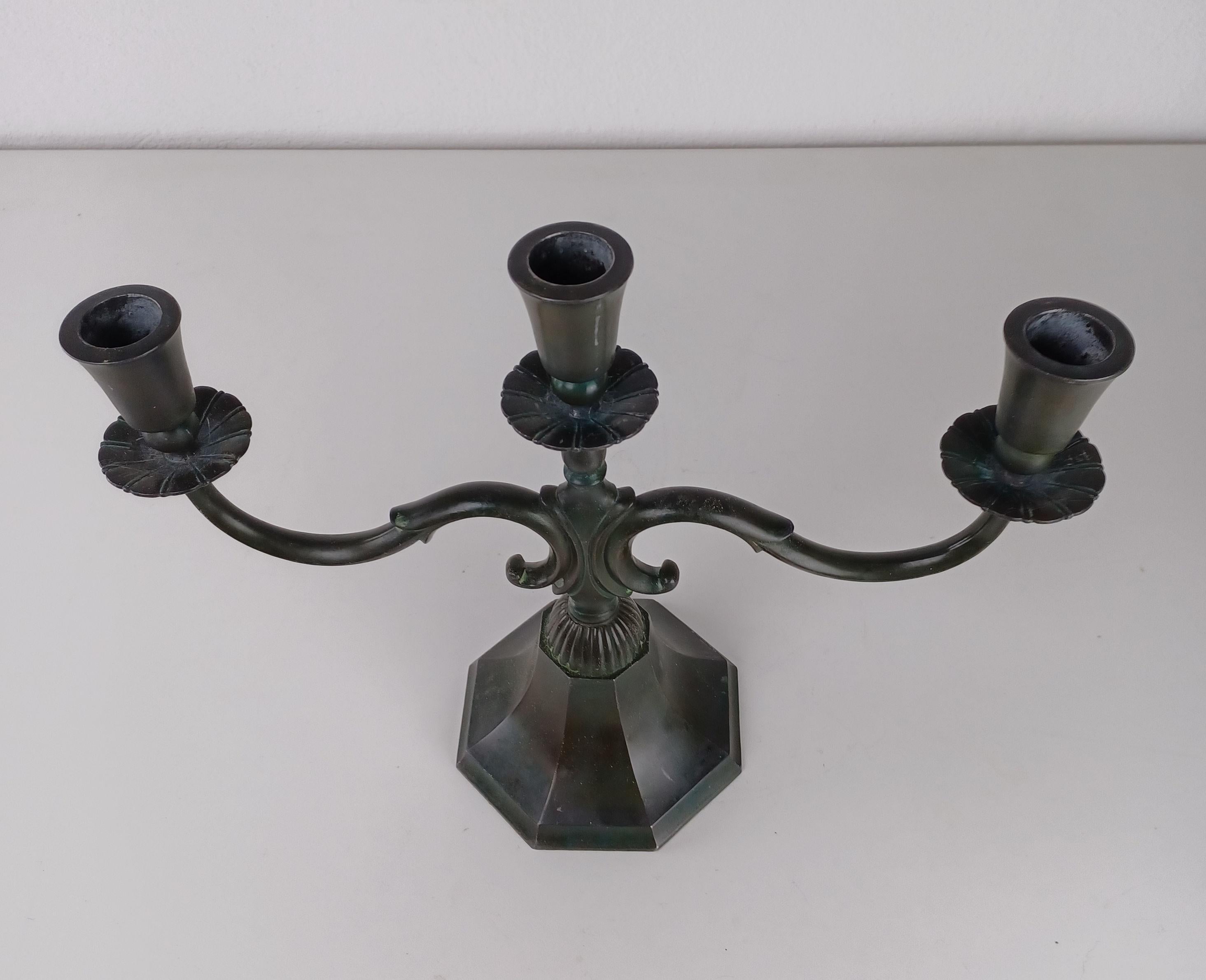 1920s art deco Danish Just Andersen disco metal candelabra.

The candlelabra is in good vintage condition and marked with Just. Andersens triangle mark. 

Just Andersen 1884-1943 was born in Godhavn on the Disko island, which is located on the west