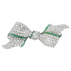 1920’s Art Deco Diamond and Emerald Bow Brooch in Platinum, 17ctw