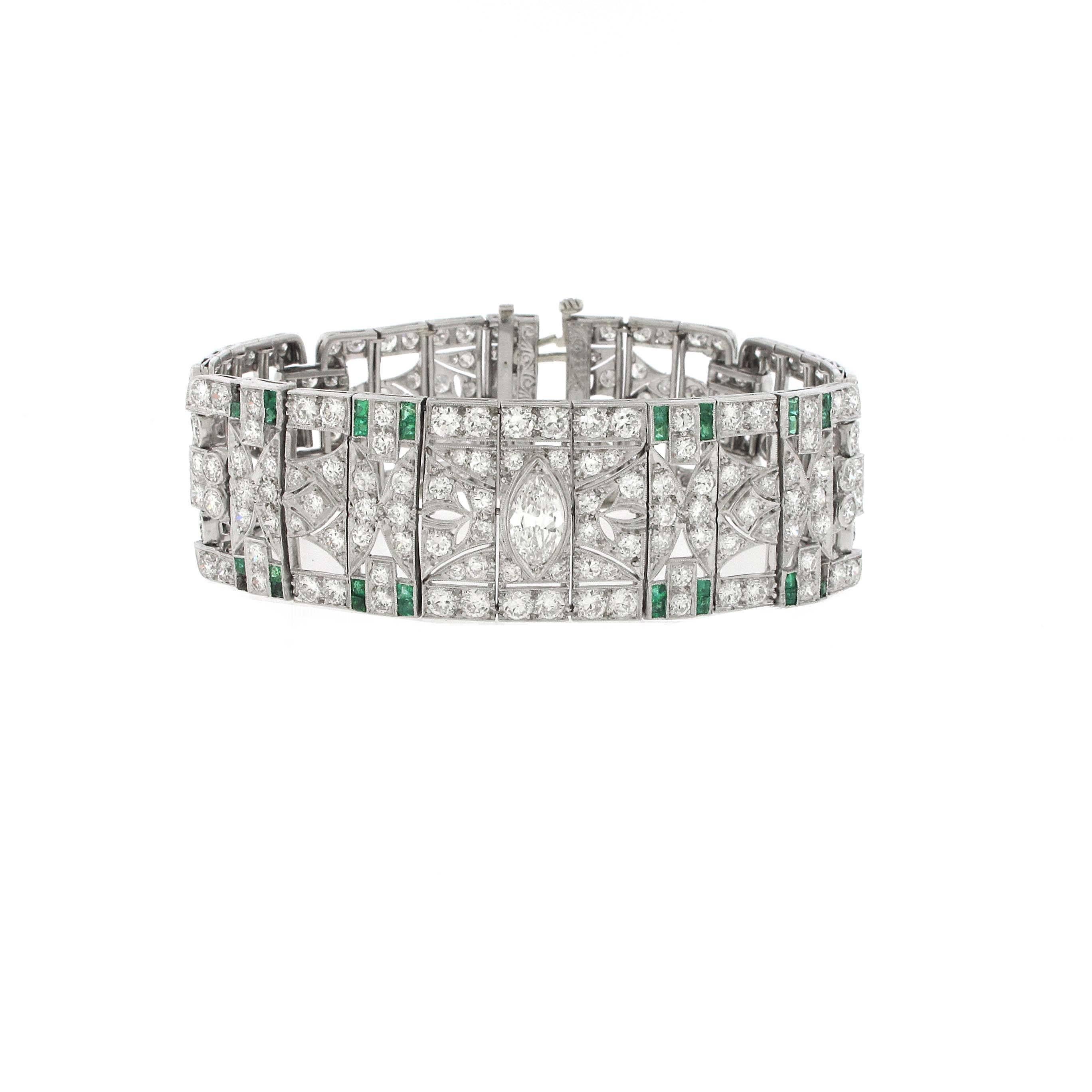 A true art deco diamond bracelet. These are the hardest bracelets to come across especially in the condition this one is in. The bracelet is in excellent condition however there are a couple of small emeralds missing. There are 3 large marquise