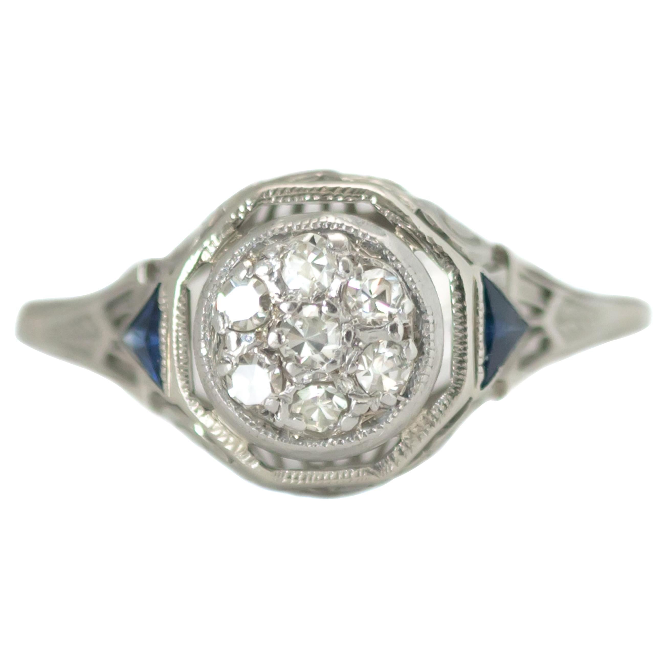 1920s Art Deco Diamond, Blue Sapphire and 18 Karat White Gold Filigree Ring