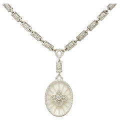 1920s Art Deco Diamond Camphor Glass Platinum Oval Drop Necklace