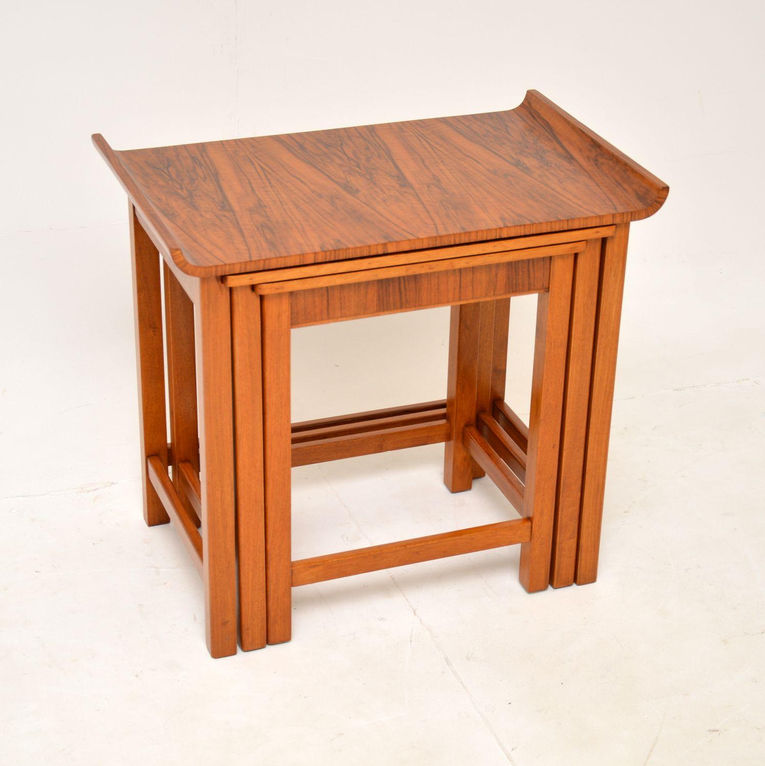 A superb original Art Deco period figured walnut nest of tables, these were made in England and date from around the 1920-30’s.

They are of amazing quality and have a very stylish design. The tables nestle under one another very smoothly, the