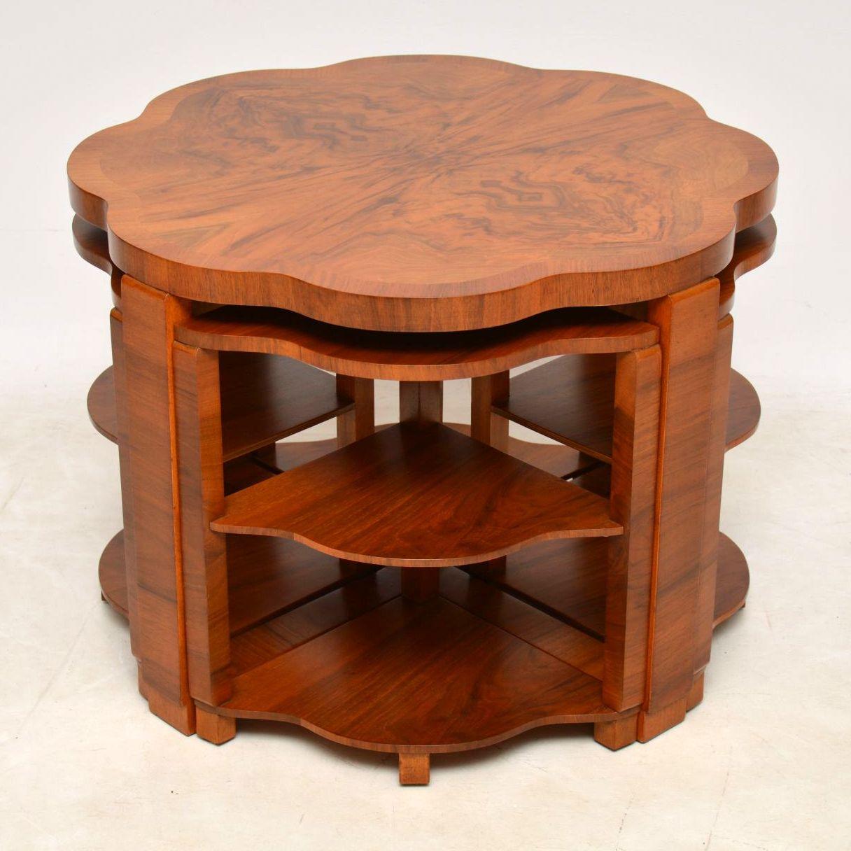 A stunning and very well made original Art Deco period nesting coffee table, beautifully made from walnut. This has a lovely flower shaped top, the quality is excellent and this is a very useful piece of furniture. We have had this fully stripped