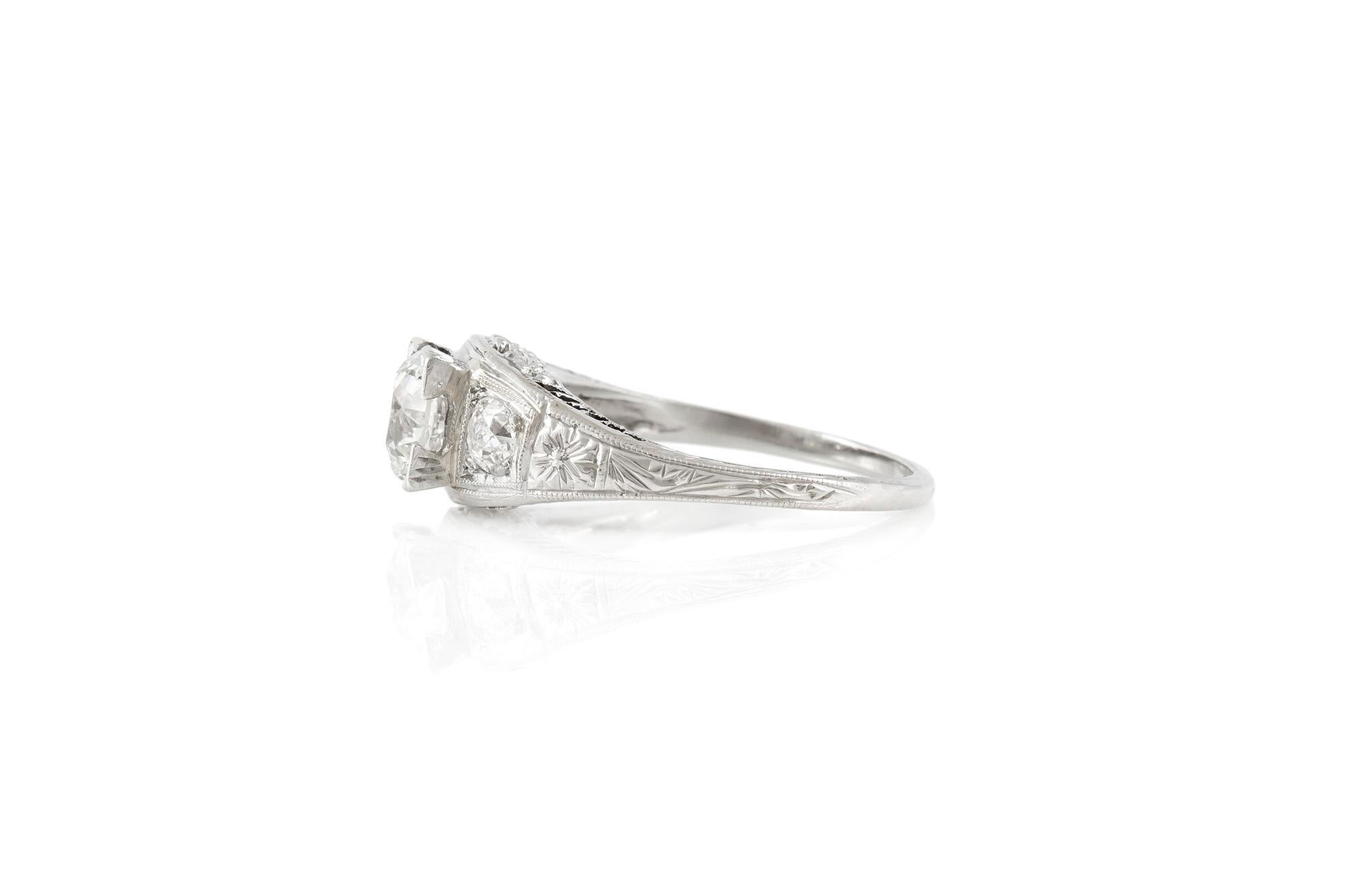 Round Cut 1920s Art Deco Filigree Platinum with 0.87 Carat Center Diamond Engagement Ring For Sale
