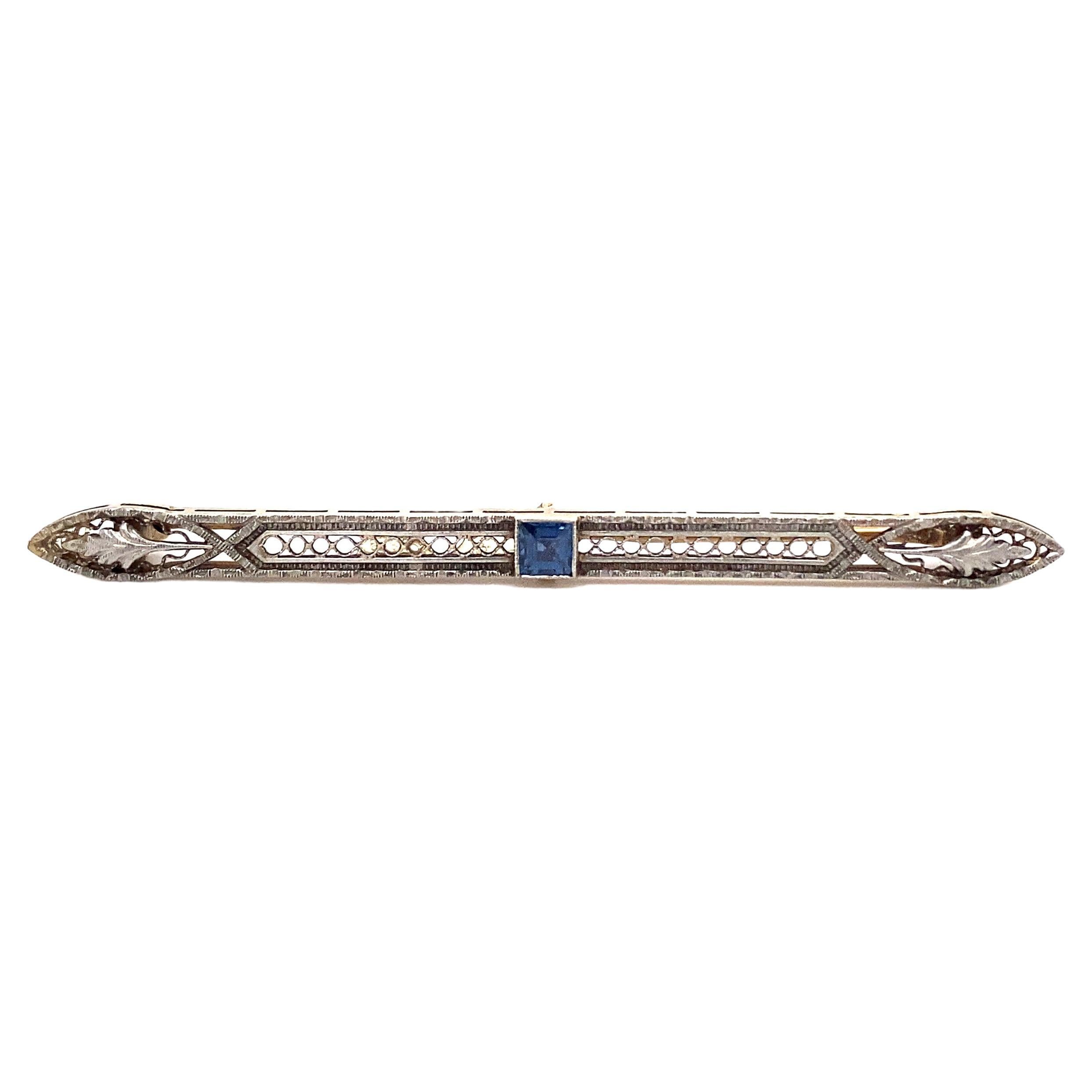 1920s Art Deco Filigree Sapphire Bar Pin in 14 Karat Gold and Platinum