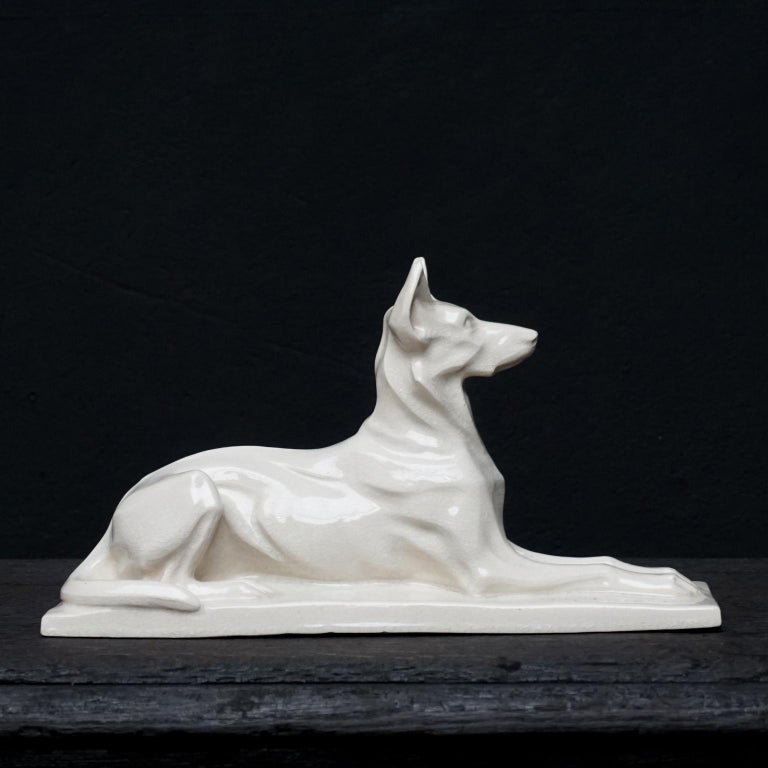 Very pretty and styled Art Deco ceramic German shepherd dog sculpture in white crackled glaze.
Charles Louis Eugène Virion (1865-1946) was a noted French animal sculptor and ceramicist.

 After the First World War, he made memorials for French